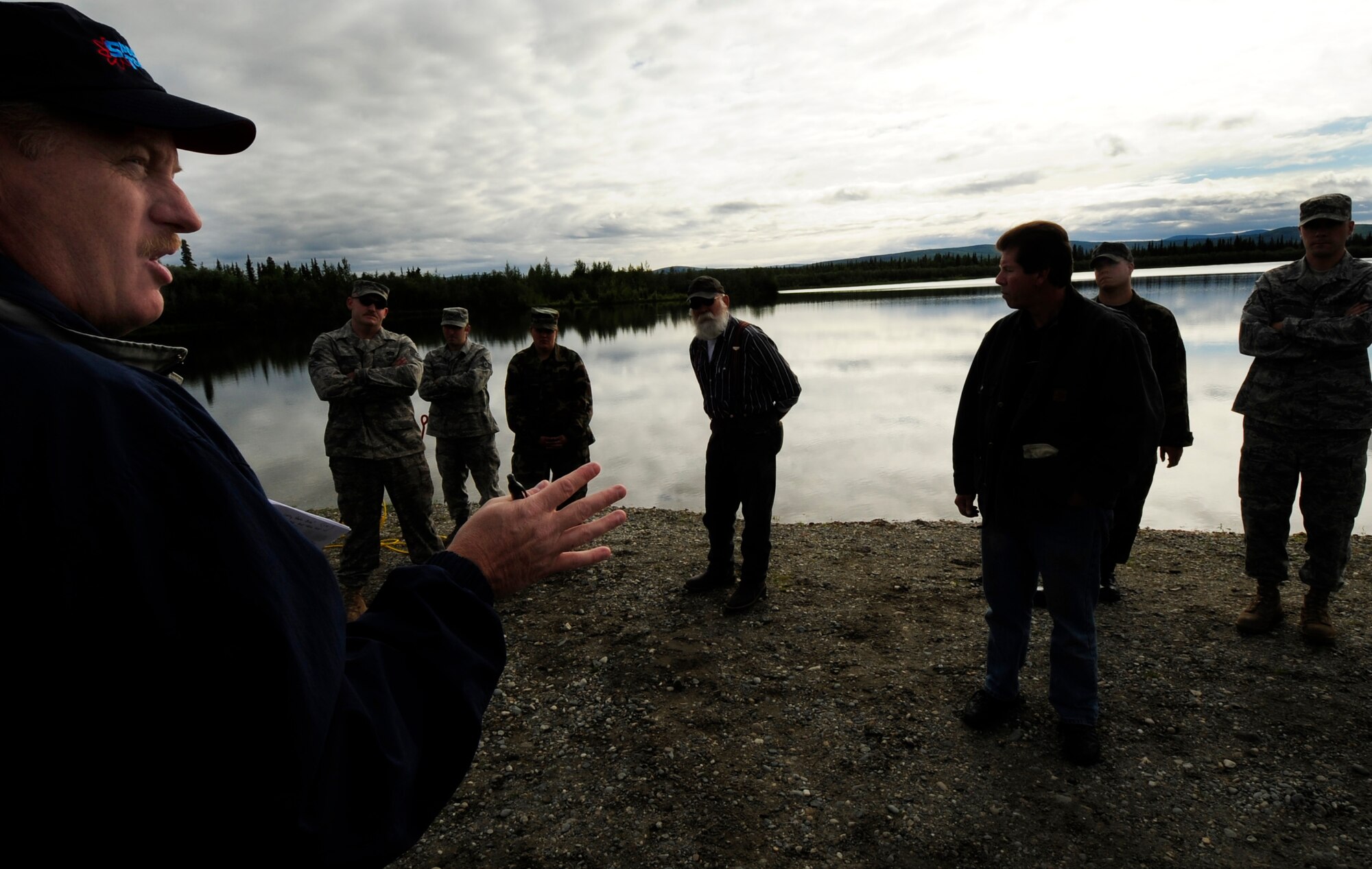 Spectra Tech corporation Senior Analyst Mr. Tracy Taylor briefs members of the 35th Civil Engineer Sqaudron on the results of the simulated oil spill exercise July 23, 2008 at Eielson Air Force Base, Alaska. This exercise is an annual requirement based on the Oil Pollution Act of 1990. (U.S Air Force Photo by Tech Sgt Eric T. Sheler)