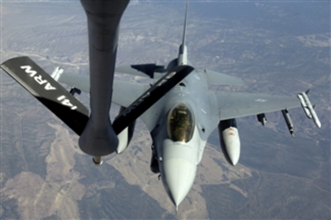 An F-16 Fighting Falcon aircraft assigned to the 4th Fighter Squadron out of Hill Air Force Base, Utah, moves into refueling position over the Nevada Test and Training Ranges during a training mission for Red Flag 08-3 at Nellis Air Force Base, Nev., on Aug. 1, 2008.  Red Flag is a multi-national exercise providing a realistic environment to practice combat scenarios.  