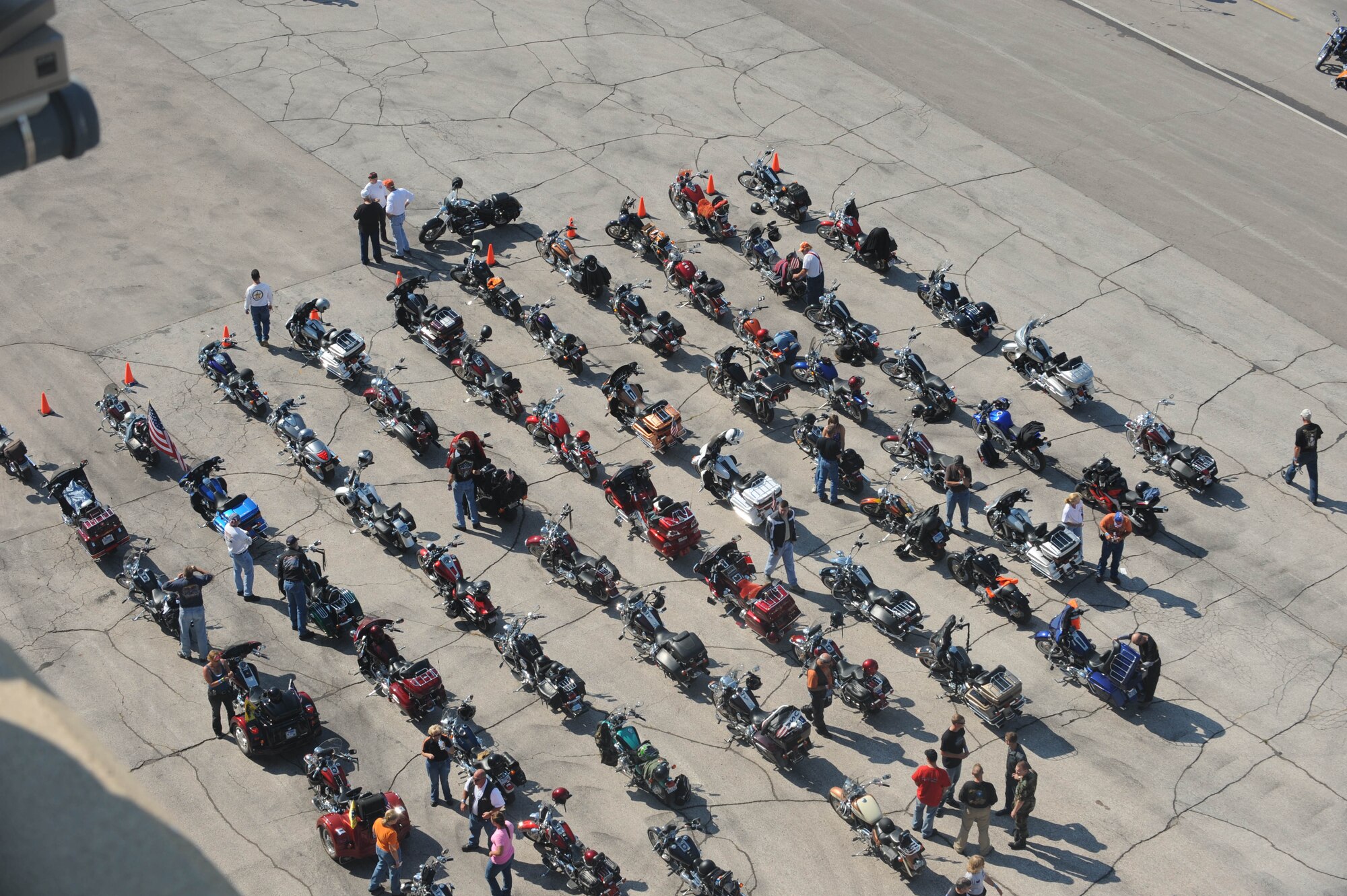 The Dakota Thunder Motorcycle Club hosted nearly 450 riders from around the United States during the annual Dakota Thunder Motorcycle Run from Ellsworth to the 68th Annual Sturgis Motorcycle Rally, Aug. 5. Members of the motorcycle club had the opportunity to view and have photos taken in front of a static display of a B-1 here before the ride to Sturgis, S.D. (U.S. Air Force photo/Airman 1st Class Adam Grant)