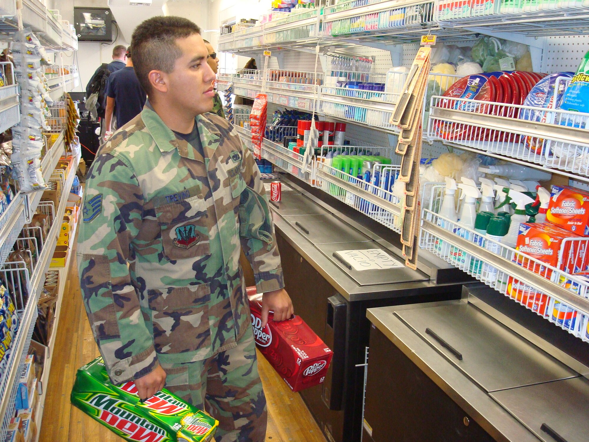 Staff Sgt. Chris Trevino, Task Force New Horizons satellite communications technician, shops the Army & Air Force Exchange Service's tactical field exchange, July 2.  AAFES is supporting New Horizons 2008 - Peru with a TFE so that troops can purchase items they need and want over the course of the three month humanitarian mission.  (U.S. Air Force photo by Capt. David Tomiyama)