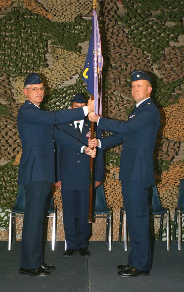 Lt. Col. David Konshok receives command of the 419th Civil Engineer Squadron from Col. Charles Mood, 419th Mission Support Group commander. Col. Konshok was previously the Senior IMA to the group commander at Air Force Materiel Command's 967th Civil Engineer Group in Eglin, Fla., which oversees more than 1,000 personnel. (U.S. Air Force photo/Staff Sgt. Kyle Brasier)