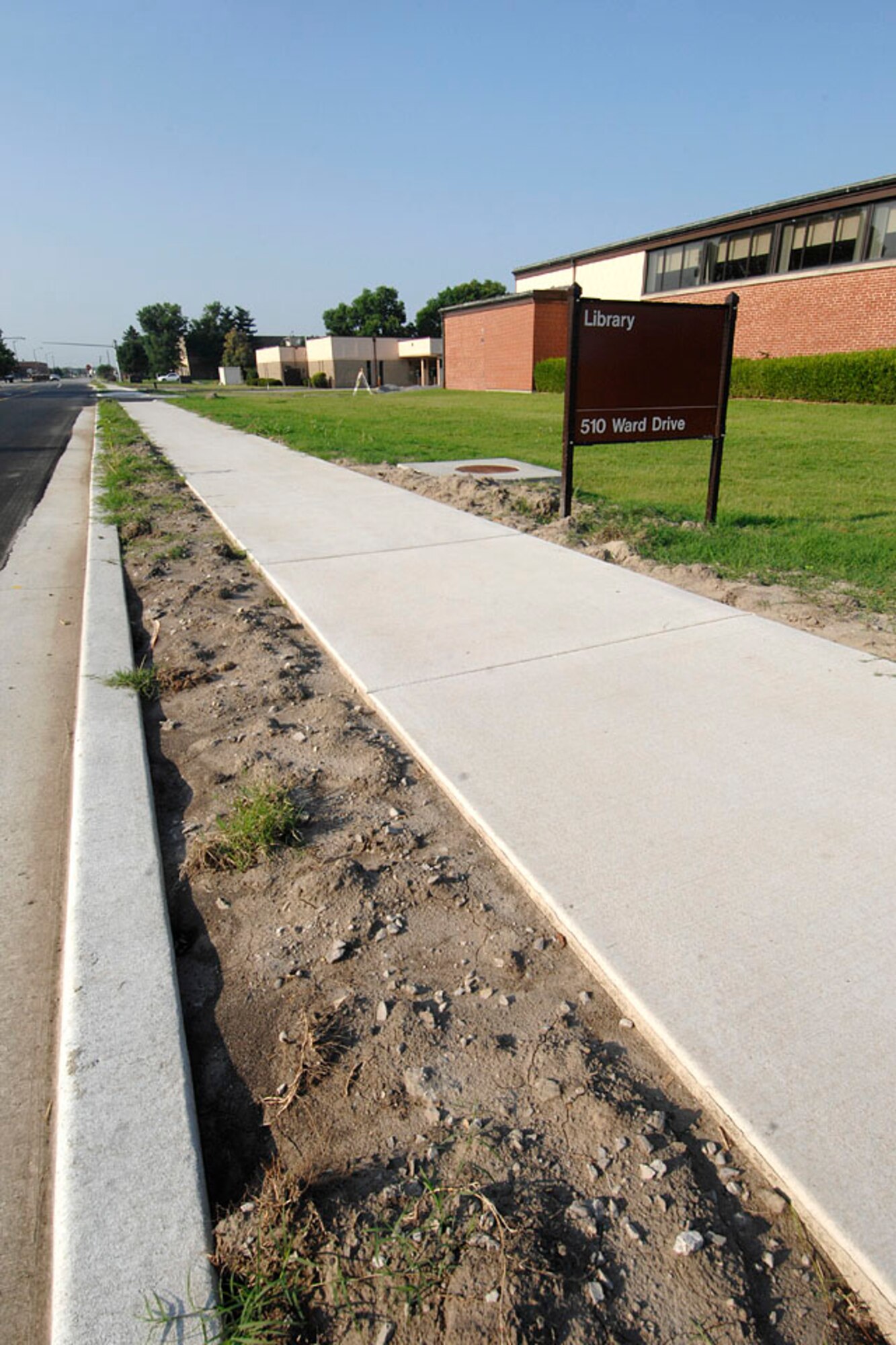 SCOTT AIR FORCE BASE, Ill.-- The newly completed sidewalk on Ward Drive ensures pedestrians can travel to many locations including the library, Pronto’s Pizza, and the shopette at a safe distance from vehicle traffic.
(US Air Force photo/Senior Airman Jonathan Lovelady)
