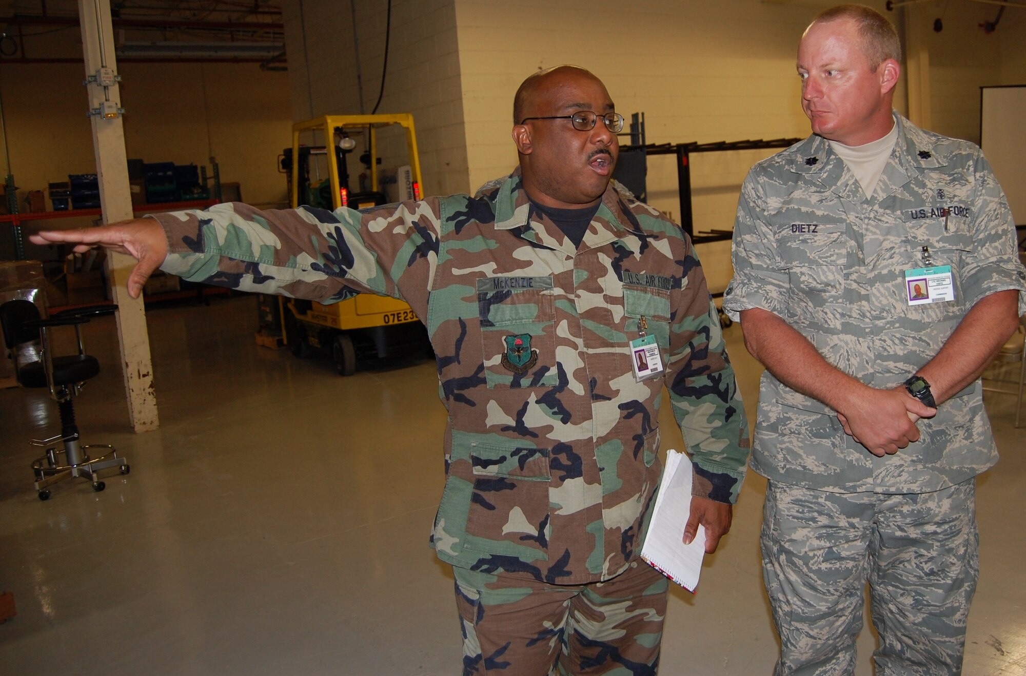 Master Sgt. Stanley McKenzie, left, 81st Medical Support Squadron, discusses warehouse capabilities with the unit’s new commander, Lt. Col. Michael Dietz.  Before arriving at Keesler, Colonel Dietz was commander of the 27th Special Operations Medical Support Squadron and administrator of the 27th Special Operations Medical Group at Cannon Air Force Base, N.M.   (U.S. Air Force photo by Steve Pivnick)
