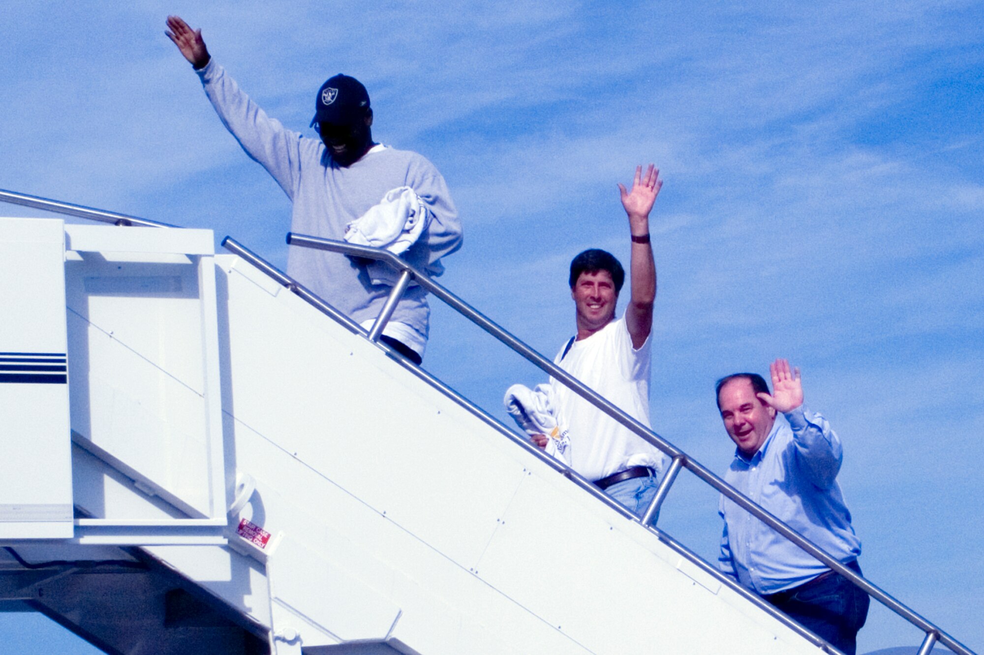 GRISSOM AIR RESERVE BASE, Ind., -- Indiana civic leaders wave goodbye as they board a KC-135R Stratotanker on Aug. 6. The group was from the Indianapolis area, and participated in a civic leader orientation flight to learn more about Grissom and its KC-135R mission. (U.S. Air Force photo/Master Sgt. Rob Hoffman)
