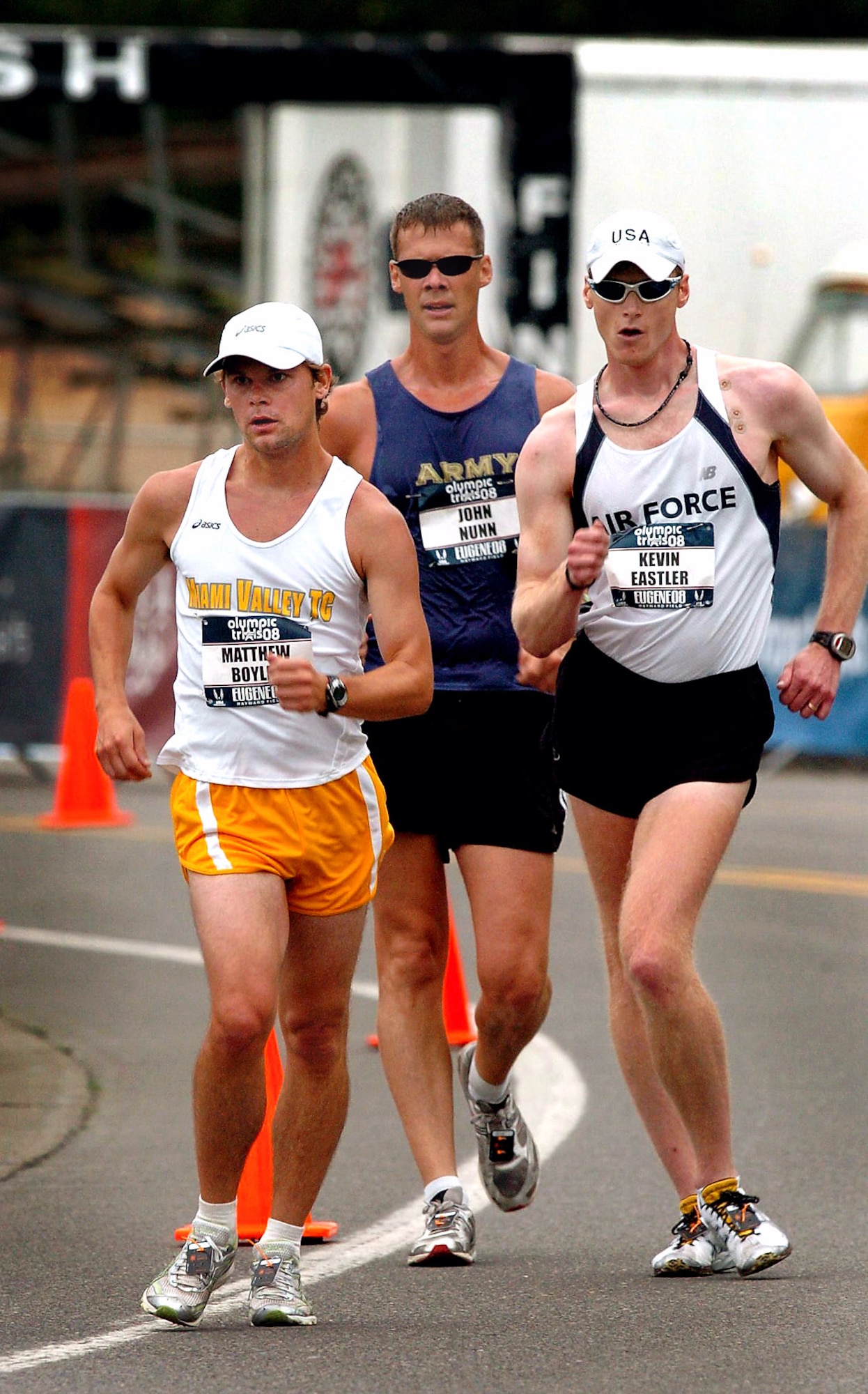 Air Force World Class Athlete Program Capt. Kevin Eastler (right) passes Army WCAP Sgt. John Nunn (center) en route to winning the 20-kilometer race walk at the 2008 U.S. Olympic Team Trials for Track & Field July 5 outside Autzen Stadium in Eugene, Ore. Eastler won the race in 1 hour, 27 minutes, 8 seconds, and was followed by runner-up Matthew Boyles (left) of Miami Valley Track Club in 1:28:20. Nunn finished fourth with a time of 1:30:35. Eastler will compete for Team USA at the Olympic Games in Beijing. (U.S. Air Force photo/Tim Hipps)