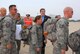 Senior Airman Sara E. Schwartzberg, 111th Maintenance Squadron, and her teddy bear wait alongside of approx. 160 guardsmen from the 111th Fighter Wing, Pa. Air National Guard, deploying from Willow Grove Air Reserve Station, Pa. to Afghanistan on July 27 to support the continuing war on terrorism.