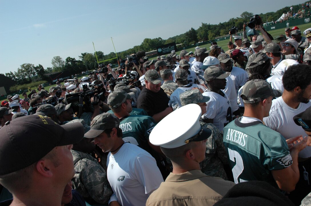 MCGUIRE AIR FORCE BASE, N.J. -- Philadlephia Eagles players give military fans their autographs as part of the annual Military Appreciation Day event where the NFL players show their thanks to their country's servicemembers.  More than 250 military members receive VIP treatment Tuesday during a visit to the Eagles Training Camp 2008 at Lehigh University in Bethlehem, PA. (U.S. Air Force photo/Master Sgt. Donna T. Jeffries)