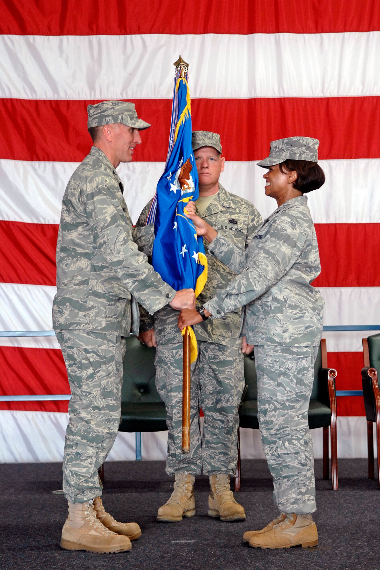 (Right) Col. Renita Alexander relinquishes her command of the 28th Mission Support Group to Col. Scott Vander Hamm, 28th Bomb Wing commander, in Dock 33, Aug. 1. The 28 MSG supports more than 16,000 active-duty members, dependents, Department of Defense civilians and military retirees living in the Rapid City area. Colonel Alexander is retiring after nearly 27 years in active-duty service. (U.S. Air Force photo/Senior Airman Marc I. Lane)