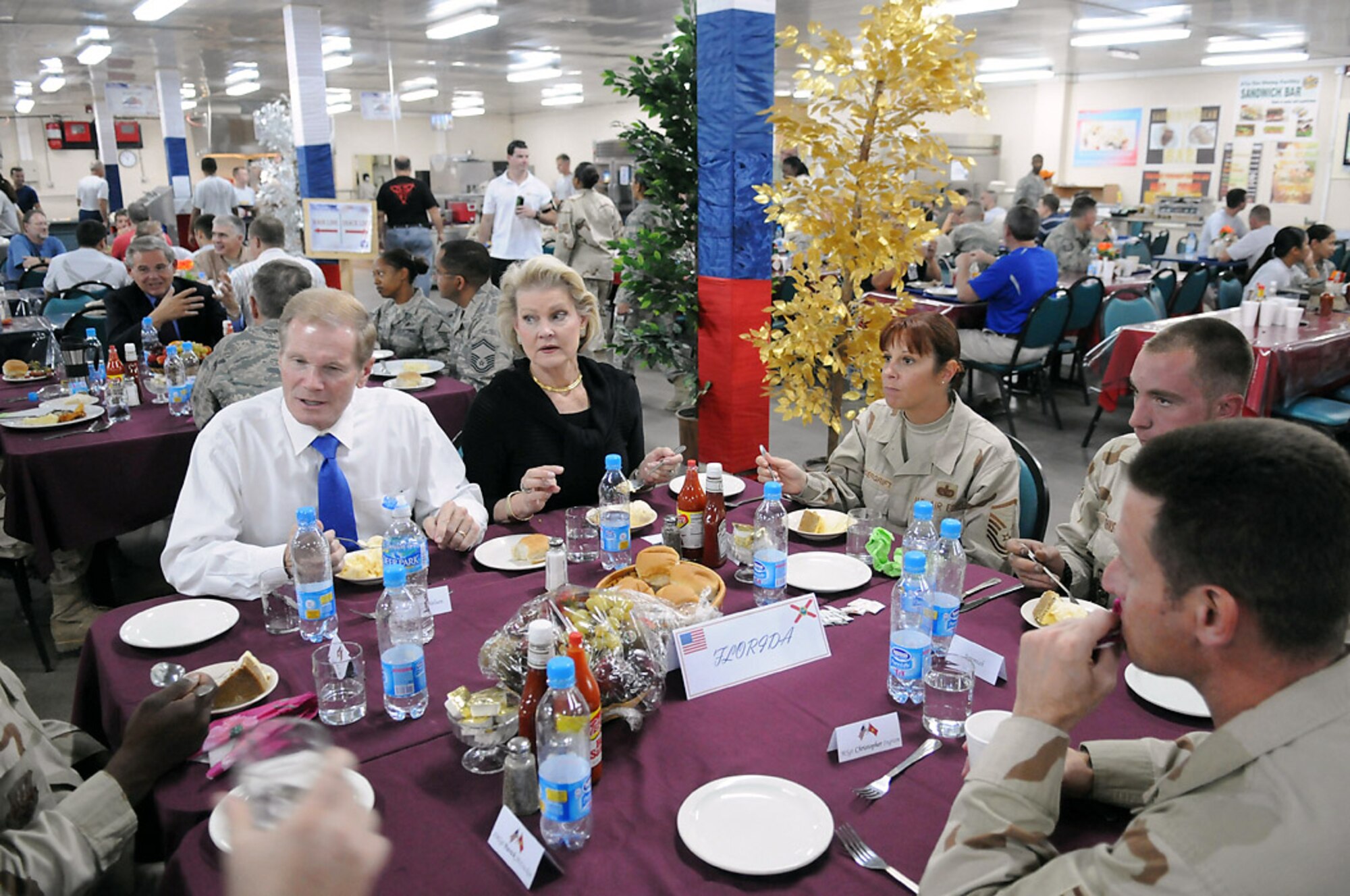 Sen. Bill Nelson and his wife, Grace, talk with Airmen from Florida during a luncheon here, Aug. 5. The Florida senator and four others visited Manas as a part of an eight-day congressional delegation trip to promote security, democracy and development in central Asia. While at Manas, the senators visited with deployed Airmen and learned about the wing's mission as an air mobility hub supporting operations in Afghanistan. (U.S. Air Force photo/Airman 1st Class Ruthann Holcomb) 
