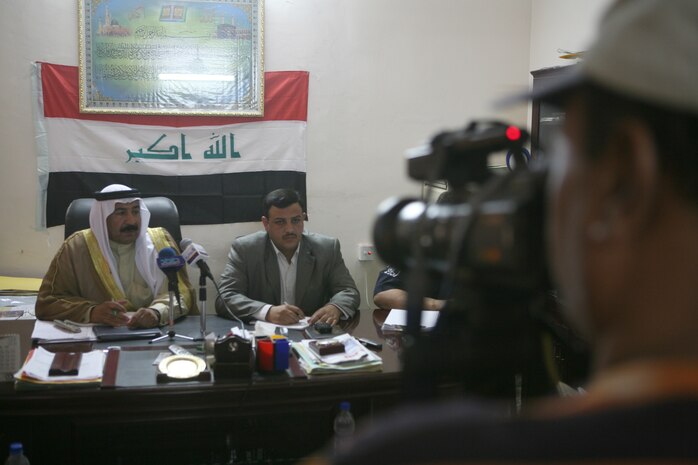 FALLUJAH, Iraq (August 8, 2008) – Sheikh Hamid Ahmed Al-Hashim, city council chairman, and Sa’ad Awad Rashad Al-Dulaimi, city Mayor, conduct a question and answer session with local Arab media after the State of the City Address for in Fallujah, Aug. 8. Hamid delivered his speech to Fallujah citizens addressing the progress the city has made this year, focusing on the quality of life projects and security improvements. (Released)(Official U.S. Marine Corps photo by Sgt. Nathaniel C. LeBlanc)