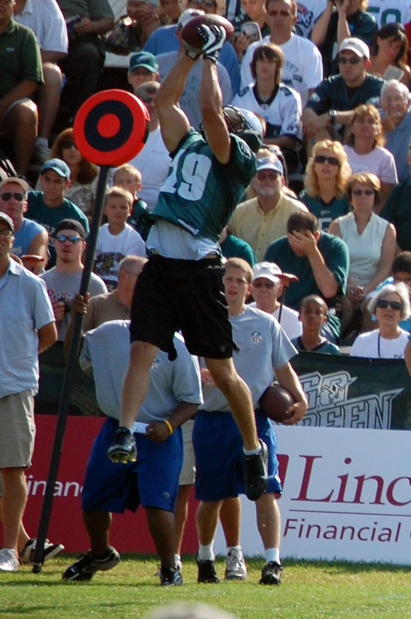 Philadelphia Eagles wide receiver-tight end Michael Gasperson (19) gets airborne to catch a pass during practice at the Eagles training camp at Lehigh University in Lehigh, Penn., Aug. 5, 2008.  Mr. Gasperson participated in signing autographs and meeting more than 200 military members attending the training camp for the Eagles' Military Day Aug. 5.  (U.S. Air Force Photo/Tech. Sgt. Scott T. Sturkol)