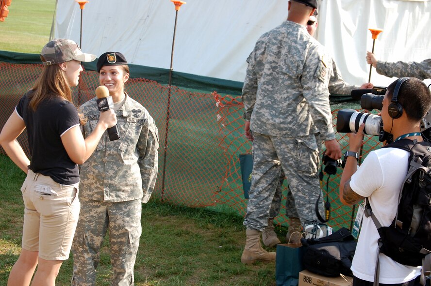 A U.S. Army Soldier is interviewed by a Philadelphia Eagles television crew during a visit to Eagles training camp at Lehigh University in Lehigh, Penn., Aug. 5, 2008.  More than 200 service members participated in the Eagles' Military Day where they were treated to breakfast and had a meet and greet with Eagles staff and players.  (U.S. Air Force Photo/Tech. Sgt. Scott T. Sturkol)