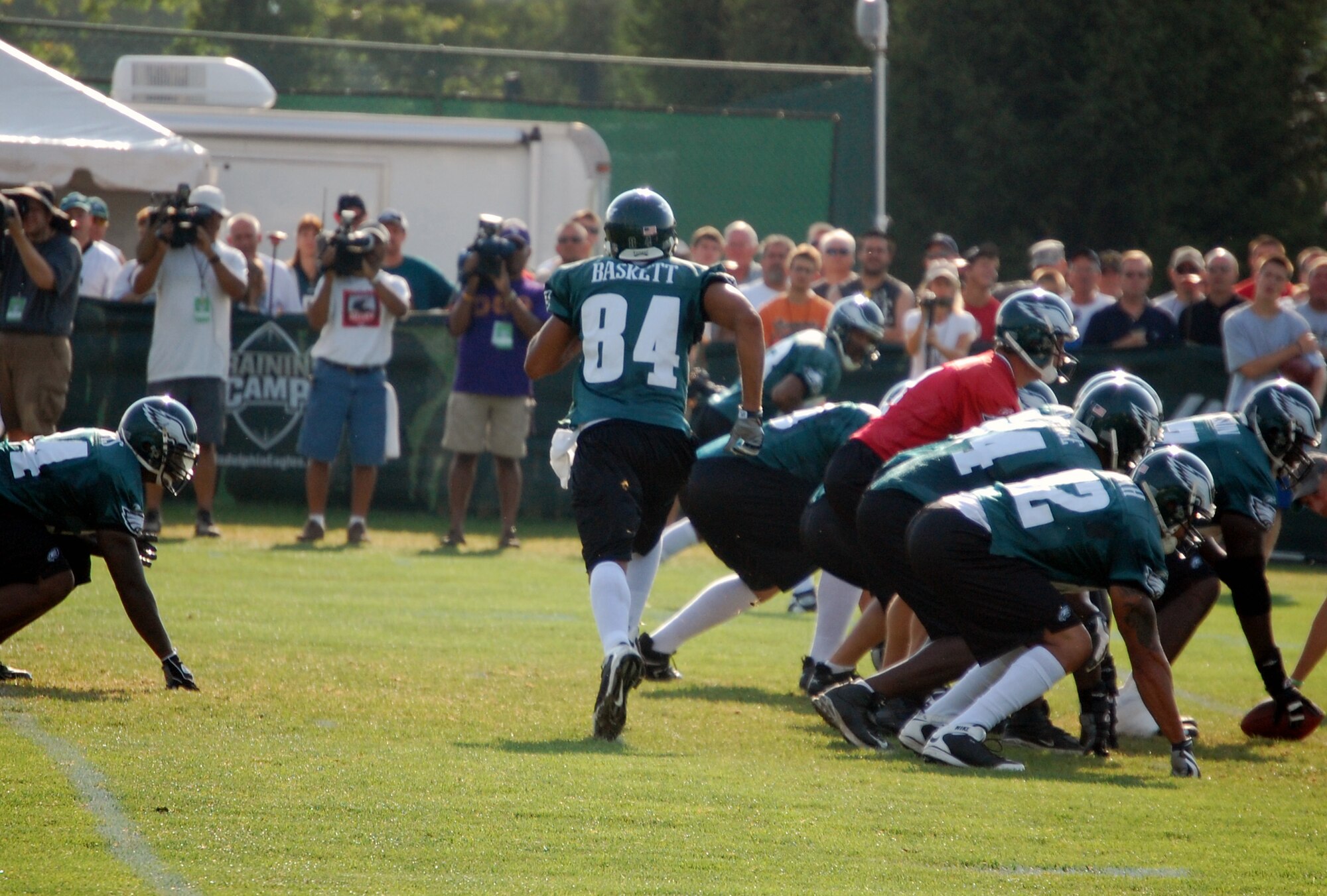 Philadelphia Eagles wide receiver Hank Baskett (84) goes in motion during practice at the Eagles training camp at Lehigh University in Lehigh, Penn., Aug. 5, 2008.  Mr. Baskett is the son of a 30-year Air Force veteran and participated in signing autographs and meeting more than 200 military members attending the training camp for the Eagles' Military Day Aug. 5.  (U.S. Air Force Photo/Tech. Sgt. Scott T. Sturkol)