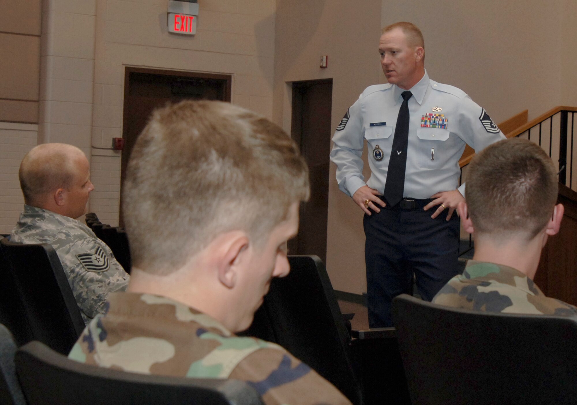 MCCONNELL AIR FORCE BASE, Kan. -- Master Sgt. Monte Mitchell, noncommissioned officer in charge, Air Force Recruiters Screening Team, briefs Airmen on special duty assignments like recruiter, military training instructor and military training leader at the base theater Aug. 5. Special duties offer Airmen the opportunity to work outside their career field.  (Photo by Senior Airman Roy Lynch III)