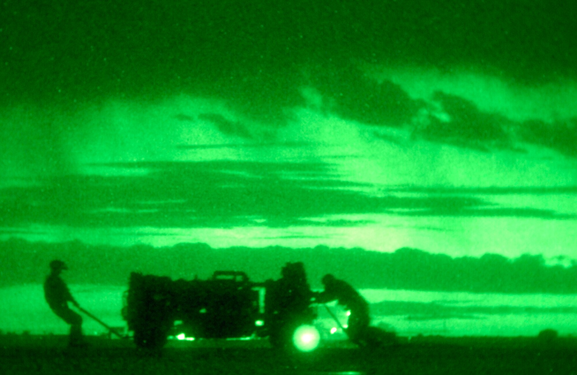 CANNON AIR FORCE BASE, N.M. -- Airmen from the 27th Special Operations Logistics Readiness Squadron push the Forward Area Manifold cart while preparing to perform a Forward Area Refueling Point mission during a training exercise on July 30. FARP is a tactical aircraft-to-aircraft ground refueling and possible arming operation. (U.S. Air Force photo/ Senior Airman Liliana Moreno)