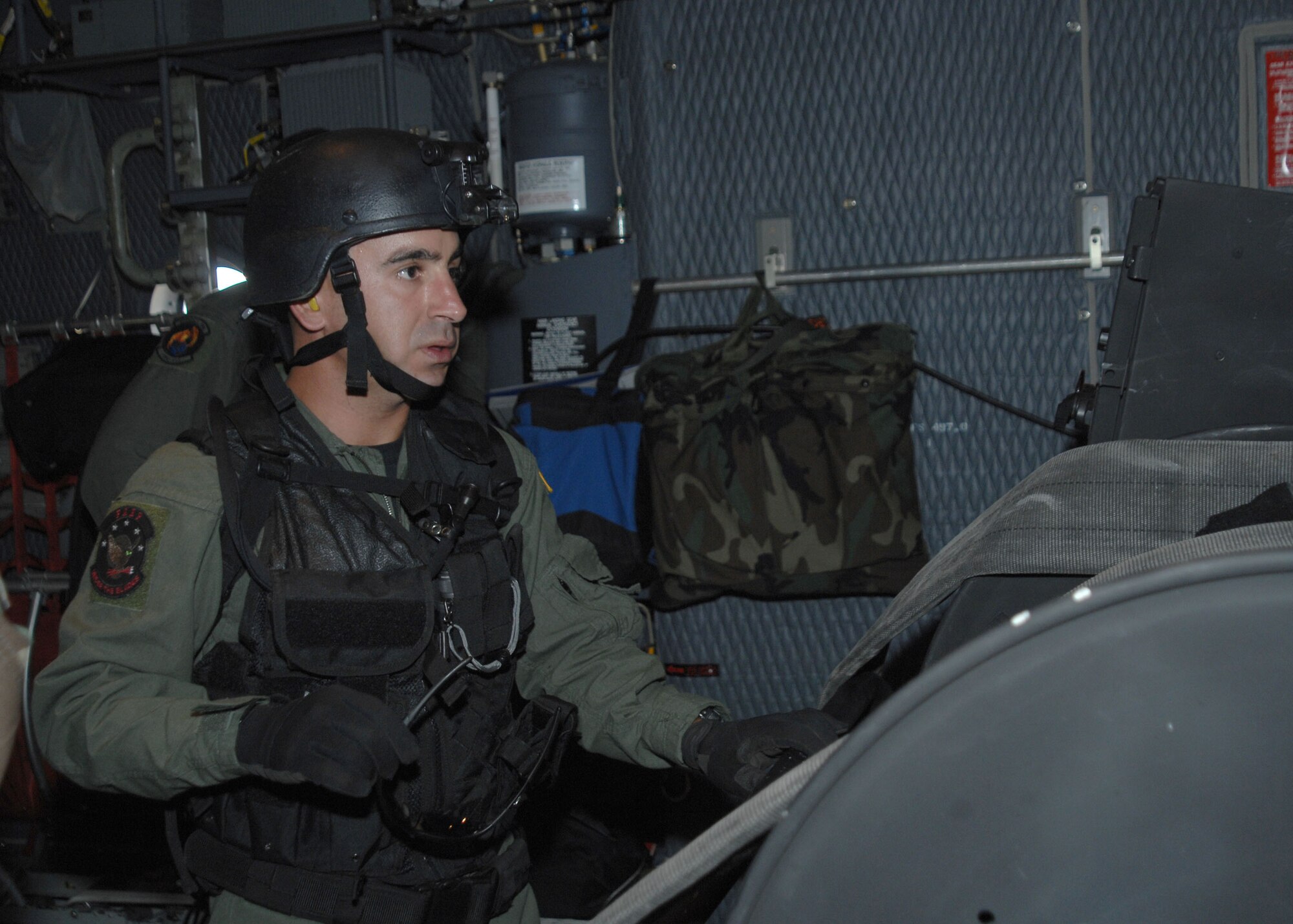 CANNON AIR FORCE BASE, N.M. -- Tech. Sgt. Joshua Creegar, 27th Special Operations Logistics Readiness Squadron, prepares to offload the Forward Area Manifold cart from the MC-130W Combat Spear July 30. Sergeant Creegar is responsible for working the brake and pushing the cart off the aircraft after given the "clear to offload" signal from the loadmasters. (U.S. Air Force Photo by Airman Maynelinne De La Cruz)