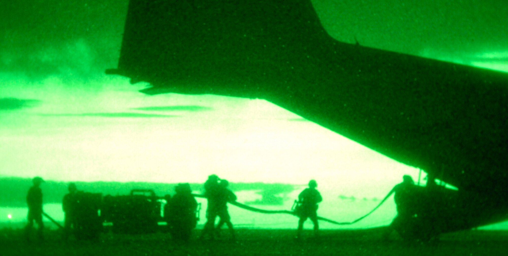 CANNON AIR FORCE BASE, N.M. -- Airman from the 27th Special Operations Logistics Readiness Squadron, prepare to perform a Forward Area Refueling Point on a MC-130W Combat Spear, during a training exercise on July 30. FARP is a tactical aircraft-to-aircraft ground refueling and possible arming operation. (U.S. Air Force photo/Senior Airman Liliana Moreno)