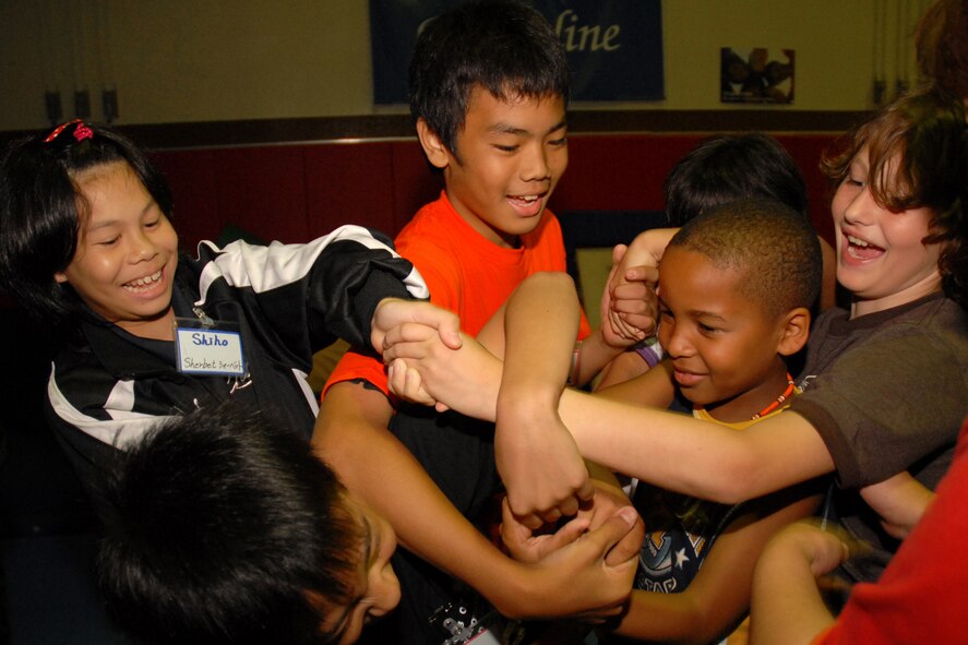 Okinawan and American kids play the knot game at the Kadena youth center during an international youth lock-in on August 2. 

The International youth lock-in is an annual event held to encourage Okinawan and American children to intermingle with each other despite language barriers.

(U.S. Air Force photo by Staff Sgt Angelique Perez)