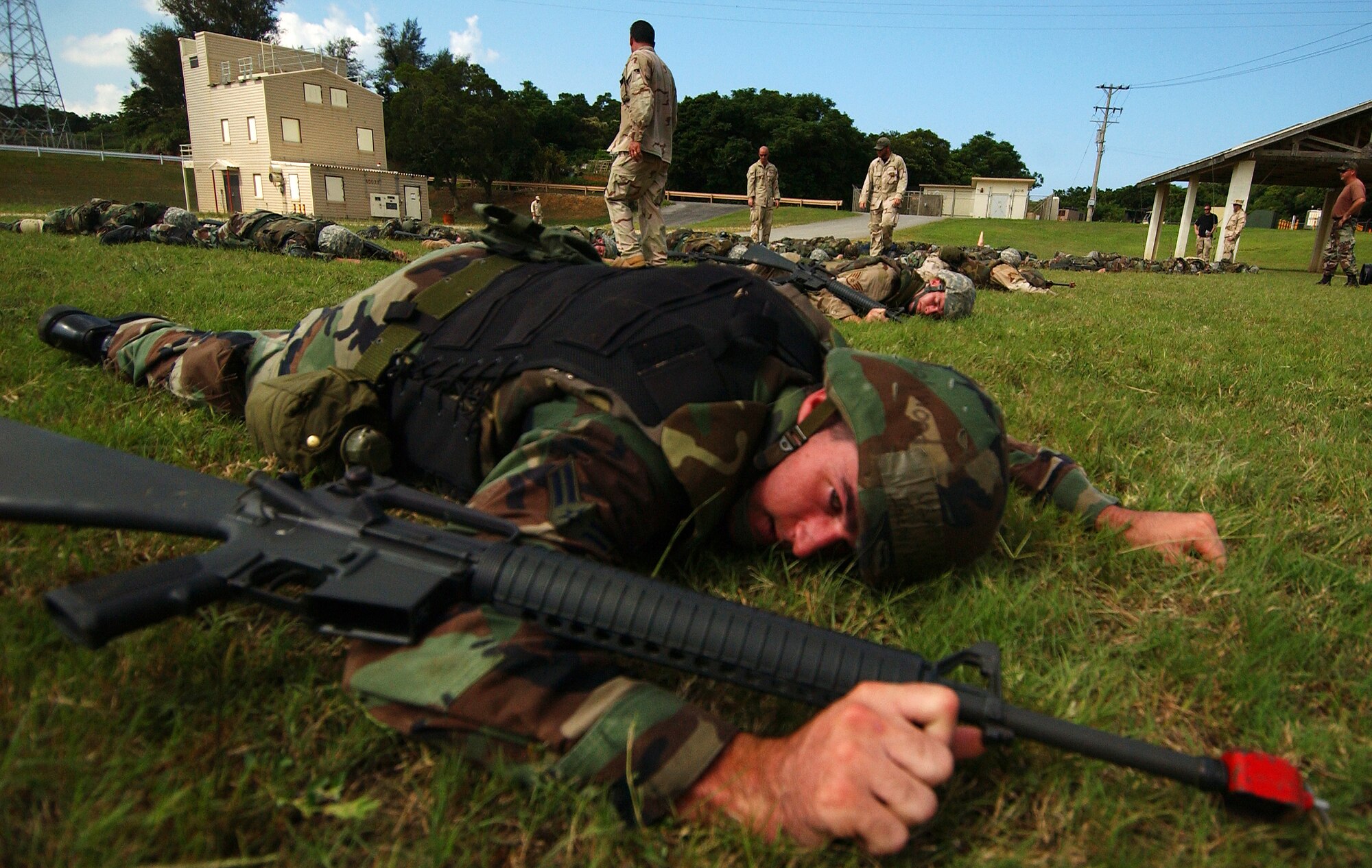 Airmen practice individual movement techniques during expeditionary combat skills training here. The three-day course included classroom instruction and training in realistic war zone situations August 2, 2008.  (U.S. Air Force photo/Tech. Sgt. Rey Ramon)