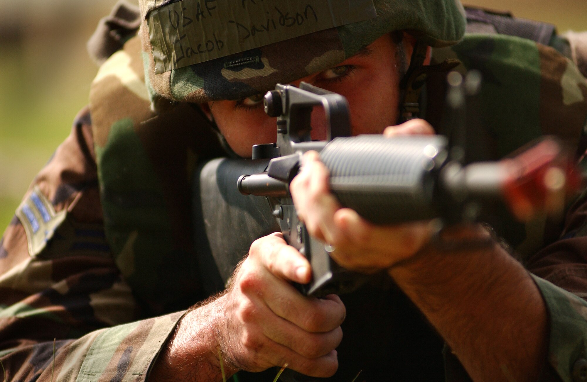 Airman First Class Jacob Davidson, 18th Communications Squadron, takes part in a three-day expeditionary combat skills training coarse August 02, 2008. The course included classroom instruction and training in realistic war zone situations.  (U.S. Air Force photo/Tech. Sgt. Rey Ramon)