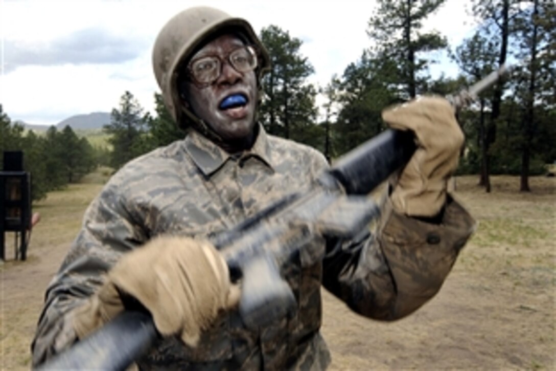 U.S. Air Force Academy basic cadet Michael Provost runs the assault course during basic cadet training in the Jacks Valley training area, U.S. Air Force Academy, Colorado Springs, Colo., July 25, 2008. 