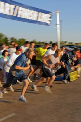 Sixty-three people participated in the Back-to- School 5K run here, Aug. 8. The run organized by the Bellamy Fitness Center staff, provided an opportunity for people on base to participate in fitness as a community. (U.S. Air Force photo/Airman Corey Hook)