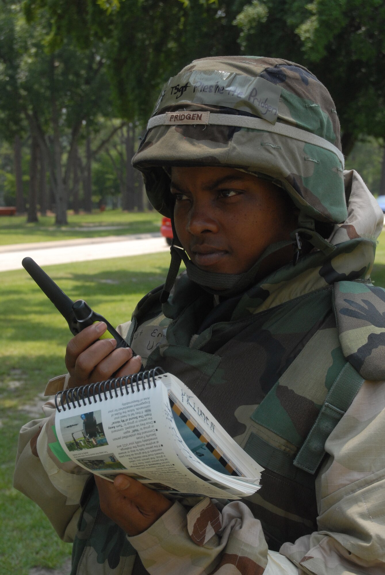 Tech. Sgt. Pleshette Pridgen, 43rd Airlift Wing, walks the perimeter of the 43rd AW headquarters building as part of a routine patrol July 30. Sergeant Pridgen and the rest of the 43rd AW spent the week of July 28 through August 2 in 24-hour operations for the base's fourth mobility exercise of the year. The exercises have been done in preparation for the 43rd AW's AMC ORI in October. (U.S. Air Force Photo by Master Sgt. Vicki Johnson)