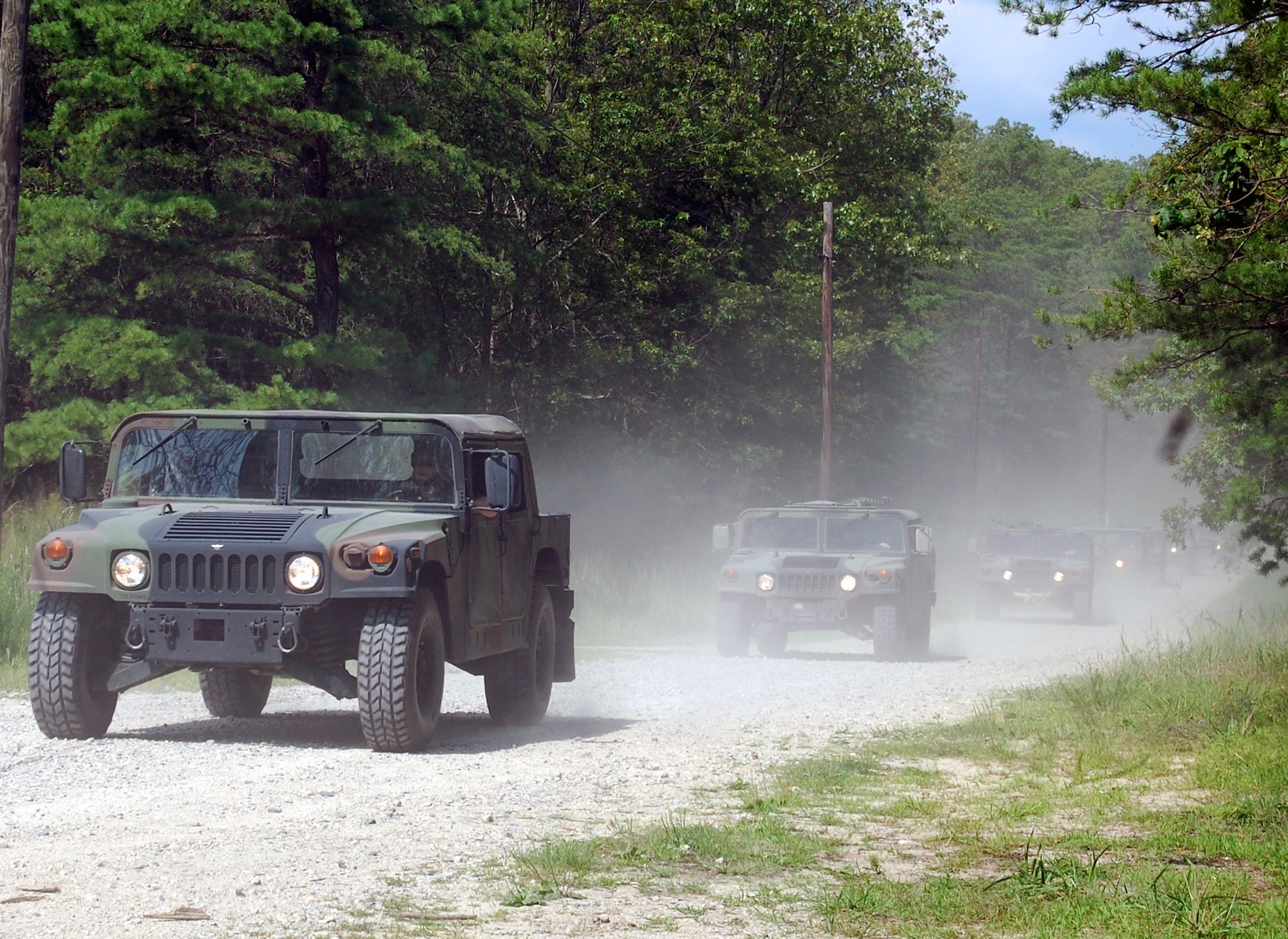 Students in the Contingency Response Mission Orientation Course drive HMMWVs on a Fort Dix, N.J., range Aug. 6, 2008, as part of a HMMWV familiarization class in the course.  The CRMOC is taught by the U.S. Air Force Expeditionary Center's Mobility Operations School and trains Airmen who are new to contingency response units.  (U.S. Air Force Photo/Tech. Sgt. Scott T. Sturkol)