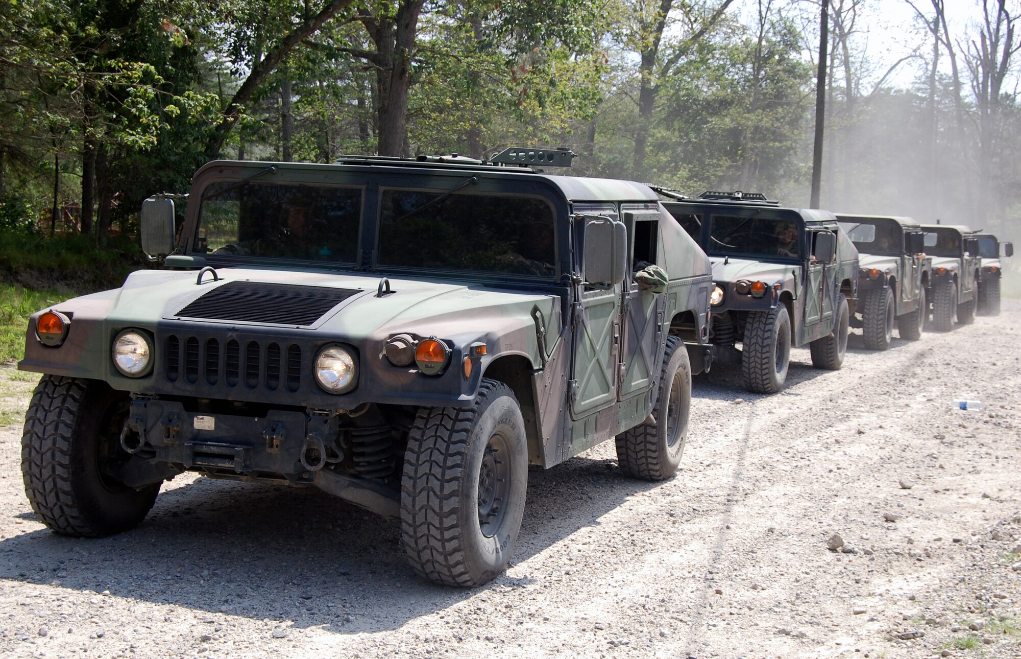 Students in the Contingency Response Mission Orientation Course prepare to roll out in HMMWVs on a Fort Dix, N.J., range Aug. 6, 2008, as part of a HMMWV familiarization class in the course.  The CRMOC is taught by the U.S. Air Force Expeditionary Center's Mobility Operations School and trains Airmen who are new to contingency response units.  (U.S. Air Force Photo/Tech. Sgt. Scott T. Sturkol)