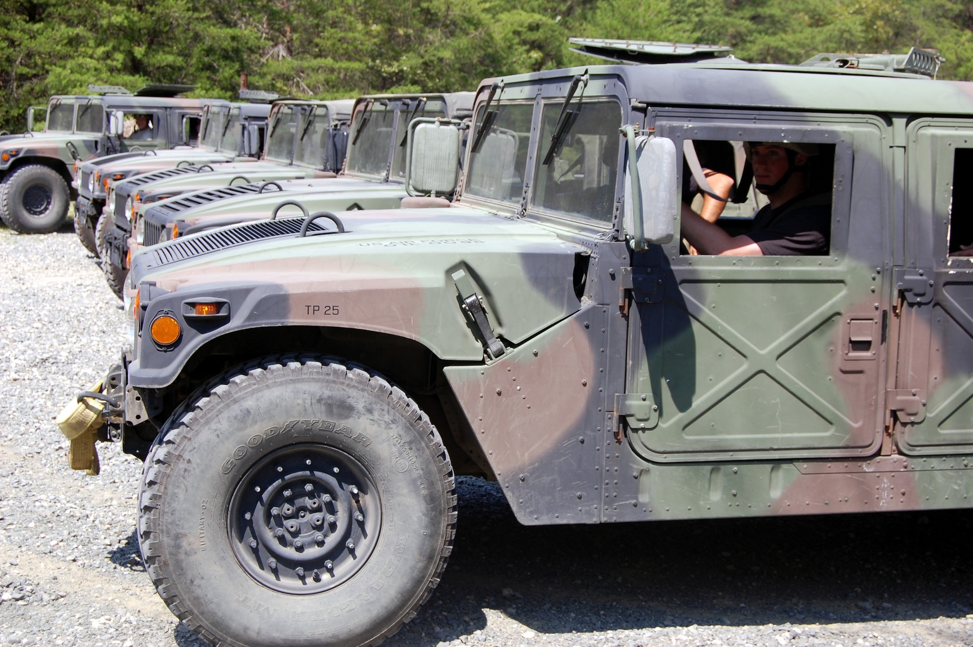 Students in the Contingency Response Mission Orientation Course prepare to roll out in HMMWVs on a Fort Dix, N.J., range Aug. 6, 2008, as part of a HMMWV familiarization class in the course.  The CRMOC is taught by the U.S. Air Force Expeditionary Center's Mobility Operations School and trains Airmen who are new to contingency response units.  (U.S. Air Force Photo/Tech. Sgt. Scott T. Sturkol)