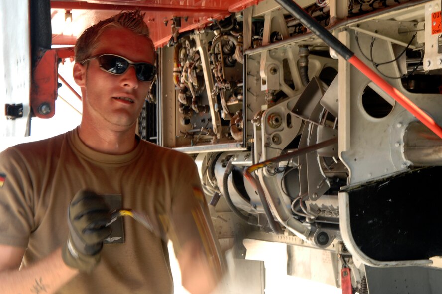BARKSDALE AIR FORCE BASE, La. - A crew chief of the Luftwaffe (German Air Force) Fighter Bomber Wing 31 "Boelcke" performs post flight procedures upon arrival here Aug. 4, for participation in Green Flag East. (U.S. Air Force photo by Airman 1st Class Joanna M. Kresge)