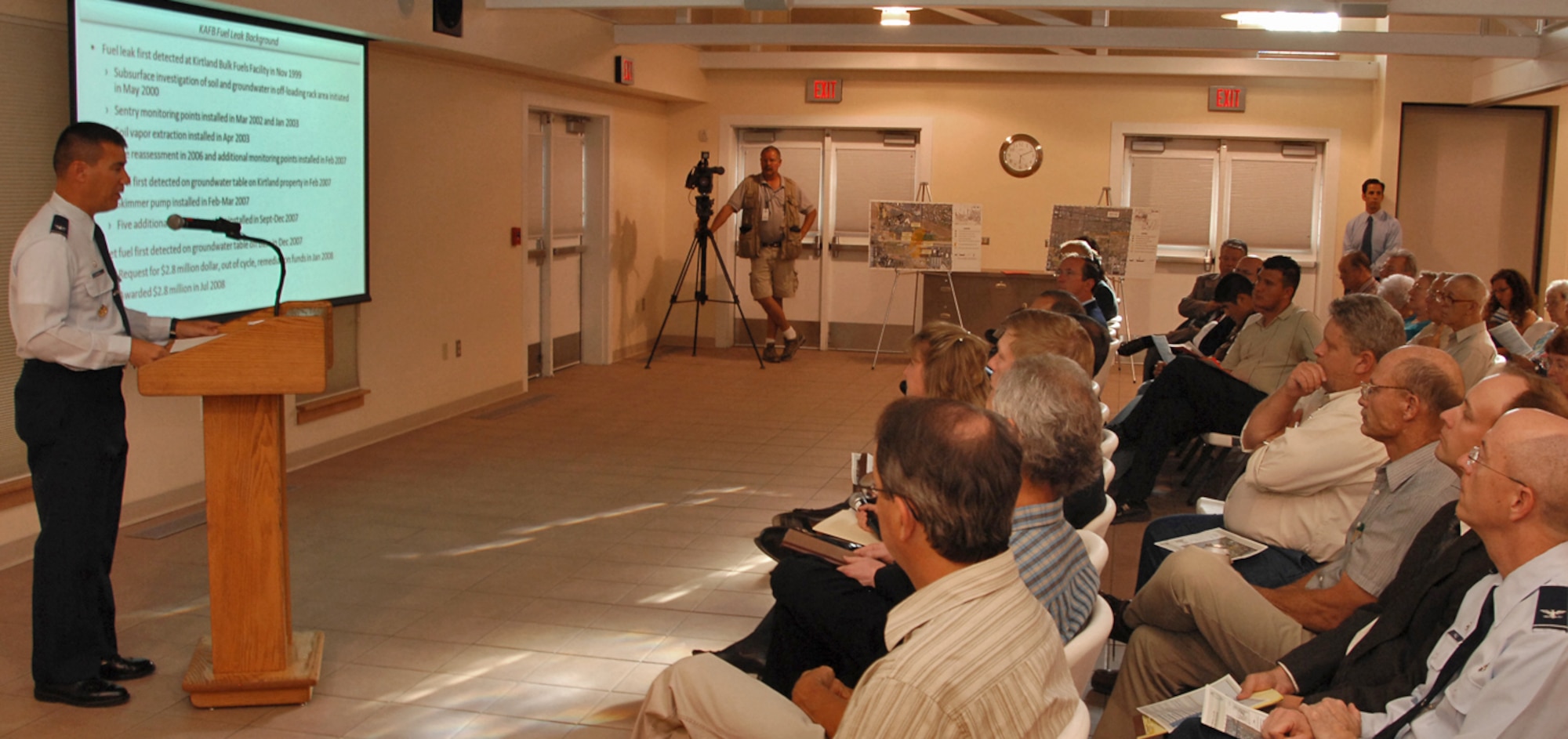 Col. Michael S. Duvall, 377th Air Base Wing commander, speaks to concerned citizens about groundwater contamination from a fuel leak that occurred at the Kirtland AFB Bulk Fuels Facility during a public meeting at the New Mexico Veteran?s Memorial, July 31. U.S. Air Force photo by Todd Berenger