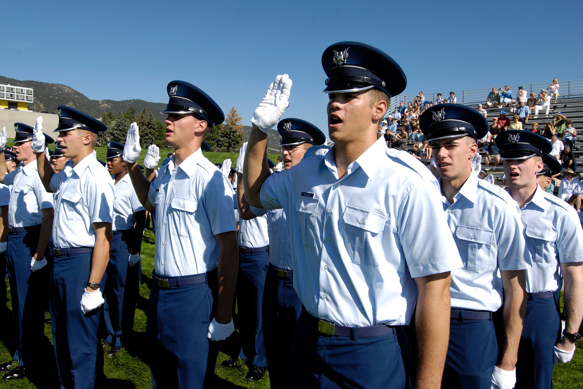 U.S. Air Force Academy Basic Cadet Mark Nelsen leads fellow trainees in reciting the honor oath Aug. 6 during Acceptance Parade events on the Stillman Parade Field at the U.S. Air Force Academy in Colorado. (U.S Air Force Photo/Mike Kaplan)
