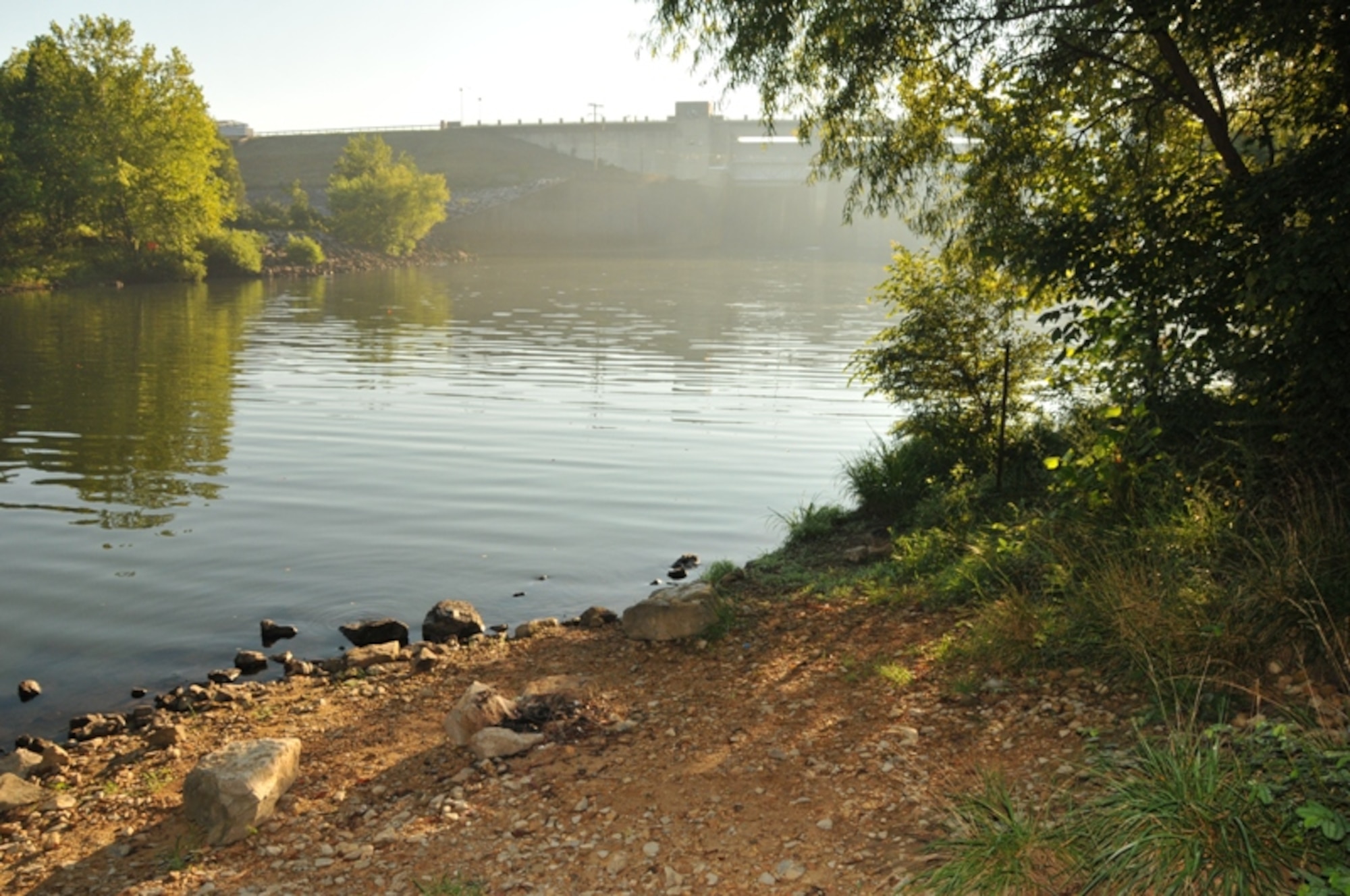 This is the way the area near the Woods Reservoir dam on Arnold Air Force Base appears after base contract personnel recently removed trash, including discarded furniture, broken glass and plastic bottles that had been illegally left there. Base officials urge people to not litter or illegally dump items on base or risk facing arrest and potential legal action. Also, officials encourage people to report illegal activity to base police at (931) 454-5662. (Photo by David Housch)