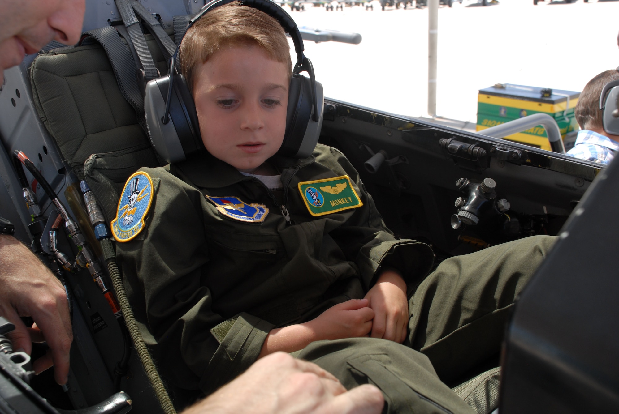 Will Tuszynski, 7, pilot-for-a-day, visited the 310th Fighter Squadron July 30 and sat in the cockpit of an F-16.