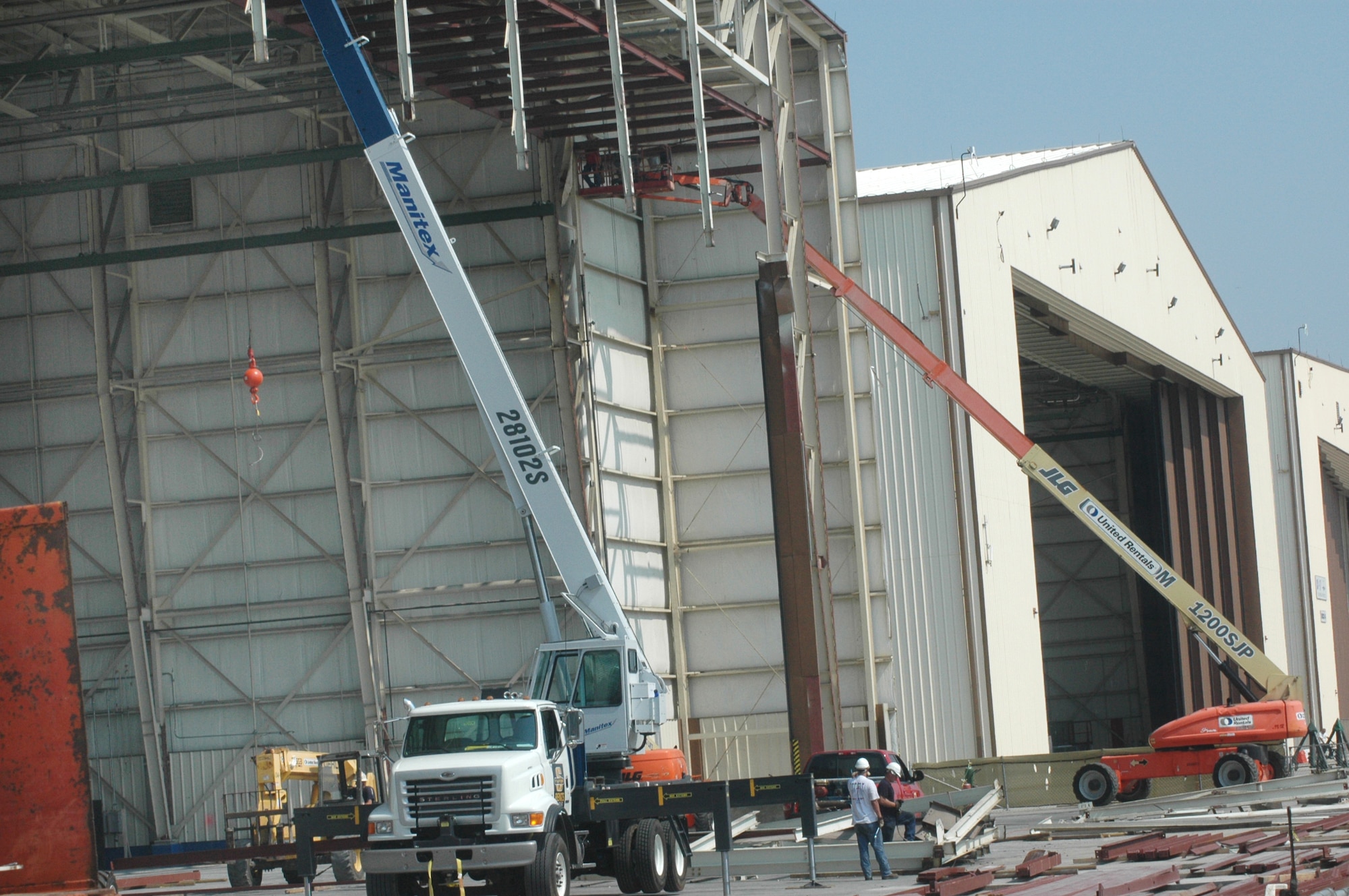 U.S. Air Force photos by Sue Sapp 
Above, Bldg. 83 is undergoing construction on the floors and doors to allow for a larger C-17 Globemaster III workload.