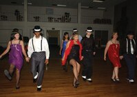 7/31/2008 - The cast of 'Mugsy Sent Me!' rehearses at the Arnold Hall Community Center Ballroom July 31. The play, opening Aug. 15, is an interactive production allowing the audience to participate in the play. (USAF photo by Alan Boedeker)                                