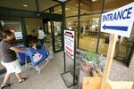7/30/2008 - Customers use an alternate entry because of construction at the Lackland commissary. (USAF photo by Robbin Cresswell) 