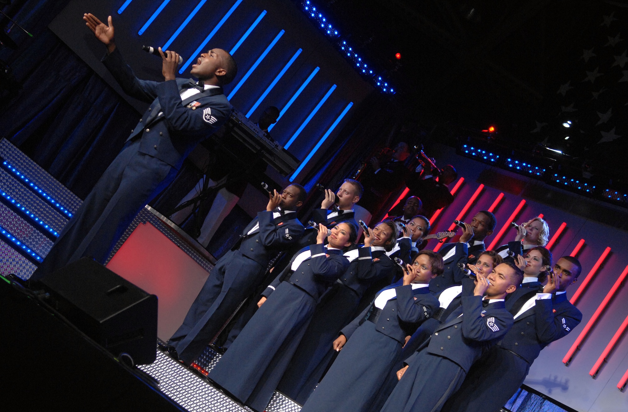 Tops In Blue ended the concert in true patriotic form as they do every year. This year they not only performed a song dedicated to those who serve, but incorporated the Airman’s Creed as well. (U.S. Air Force photo by Staff Sgt. Tyrona Pearsal)