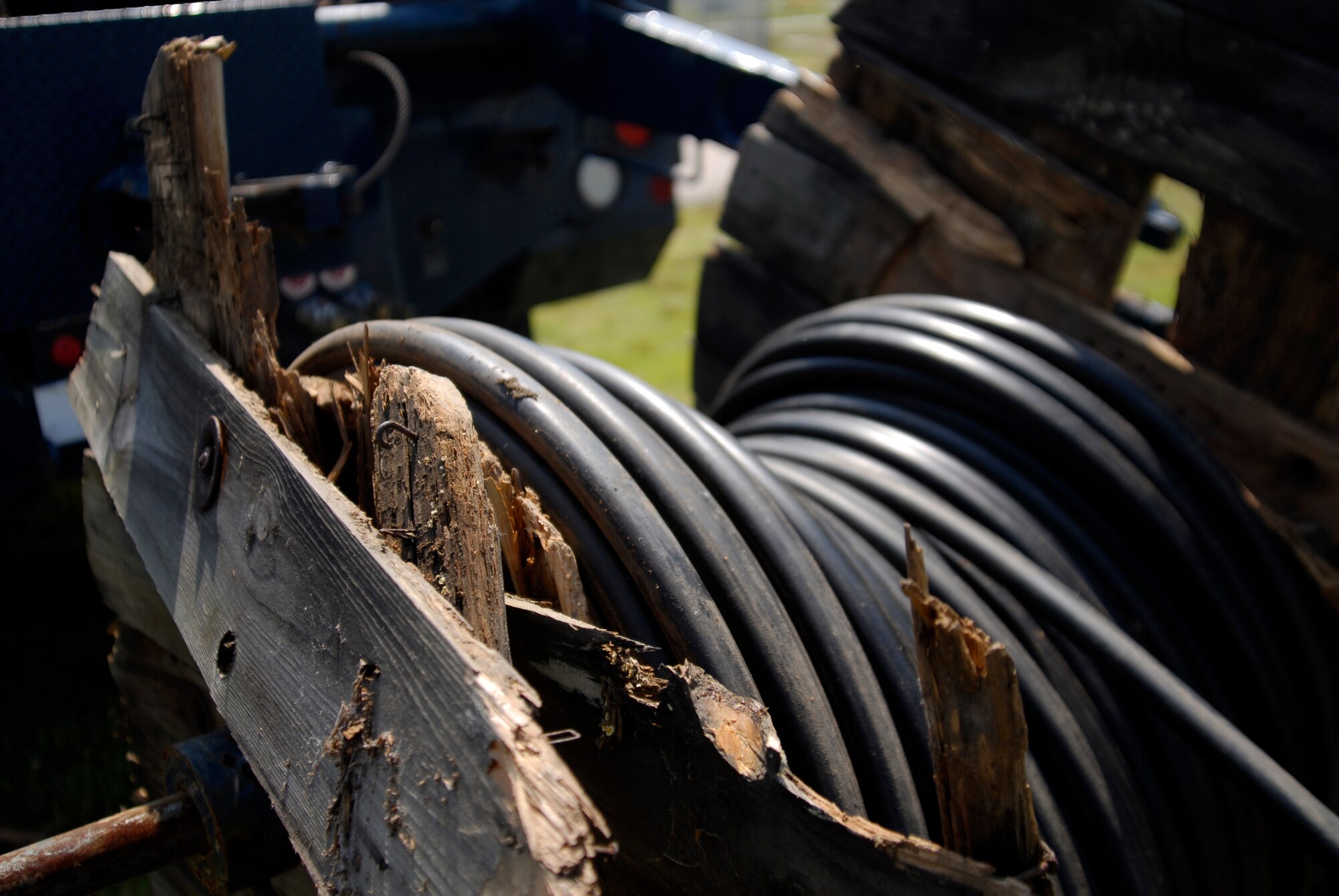 A spool of communications wire sits damaged during a cable laying job on Kunsan Air Base, South Korea, 08 Aug 2008. (U.S. Air Force photo/Staff Sgt. Jason Colbert)