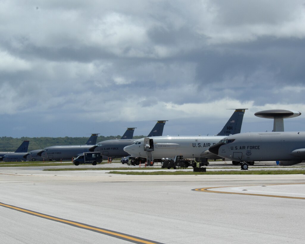 ANDERSEN AIR FORCE BASE, Guam - Air Force fighters, bombers, tankers and air control aircraft occupy the flightline here July 28. The aircraft, deployed from several Air Force bases, are here to promote regional security and stability through three main focus areas: a continuous forward presence; a robust international exercise and training program; and significant joint military training exercises.  By maintaining a continuous forward presence and conducting joint exercises, the Pacific Air Force is able to foster improved relations and interoperability with its regional friends and allies. (U.S. Air Force photo by Airman 1St Class Cory Todd)