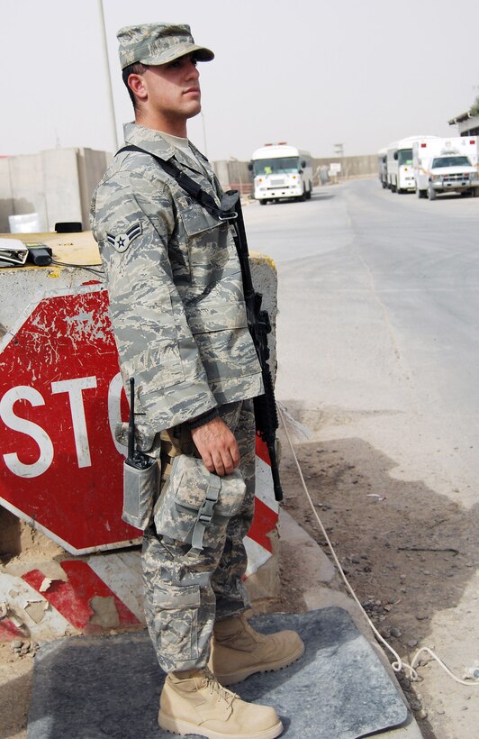 Air Force Airman 1st Class Murad Mohiadeen defends an entry control point near the Air Force Theater Hospital at Joint Base Balad, Iraq, Aug. 2, 2008. Mohiadeen, a native of Baghdad, was raised in the United States when his family emigrated from Iraq in 1990. He is a security forces apprentice with 332nd Expeditionary Security Forces Squadron here and is deployed from Royal Air Force Station Lakenheath, England. U.S. Air Force photo by Staff Sgt. Don Branum, 332nd Air Expeditionary Wing

