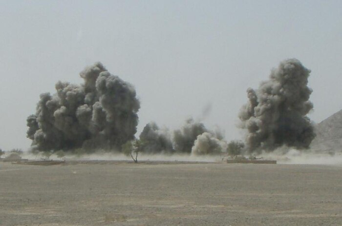 Smoke billows from a 500-pound bomb dropped during the intense battle for the city of Shewan.  During the battle, Marine snipers attached to Task Force 2d Battalion, 7th Marine Regiment, Special Purpose Marine Air Ground Task Force Afghanistan, killed more than 50 insurgents and wounded several more.