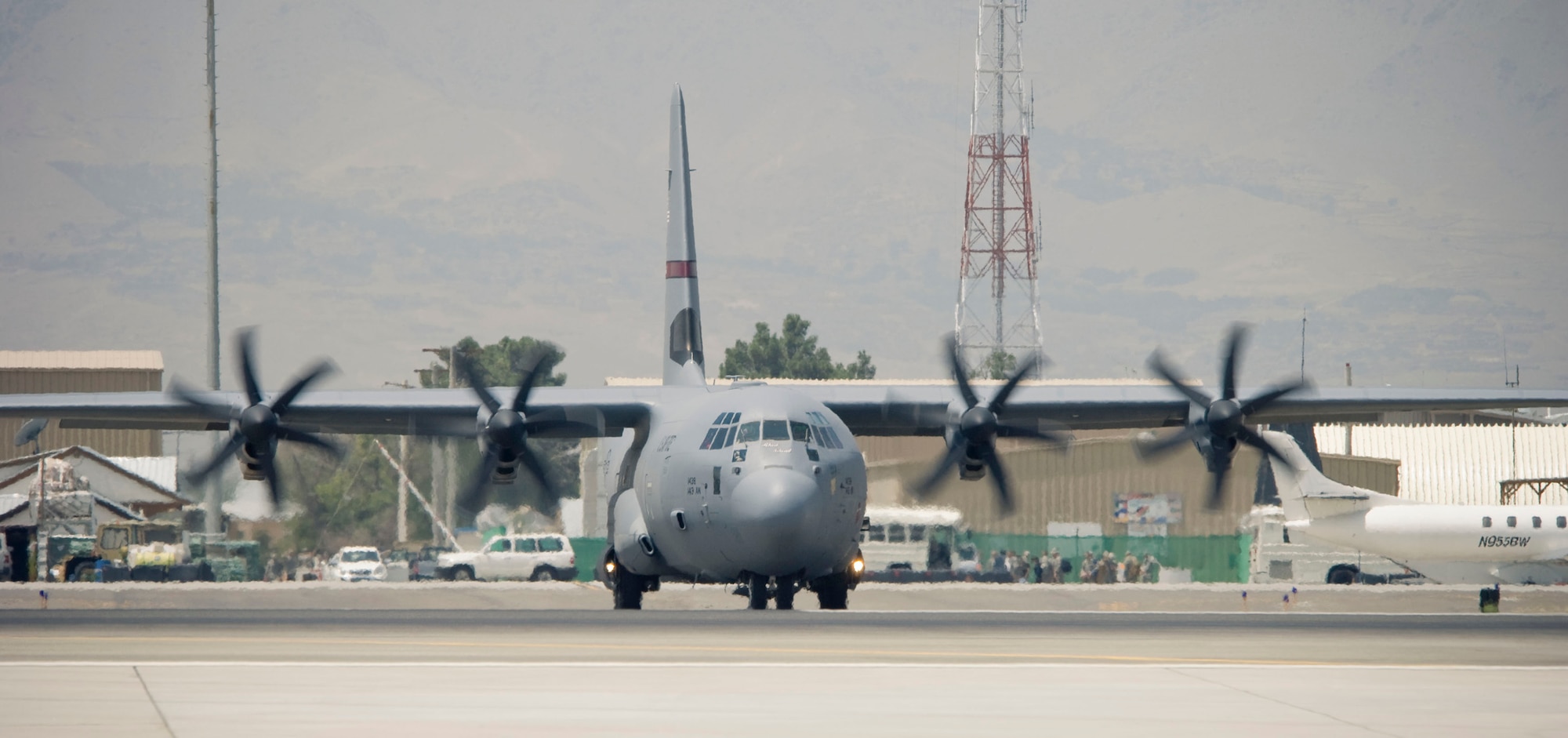 BAGRAM AIR FIELD, Afghanistan -- A C-130J Hercules taxis out to the runway here on August 1, 2008. The C-130Js form the backbone of the 455th Air Expeditionary Wing's transportation and supply mission, being the largest fixed-wing cargo airframe capable of landing on a dirt runway. (U.S. Air Force photo by Staff Sgt. Samuel Morse)