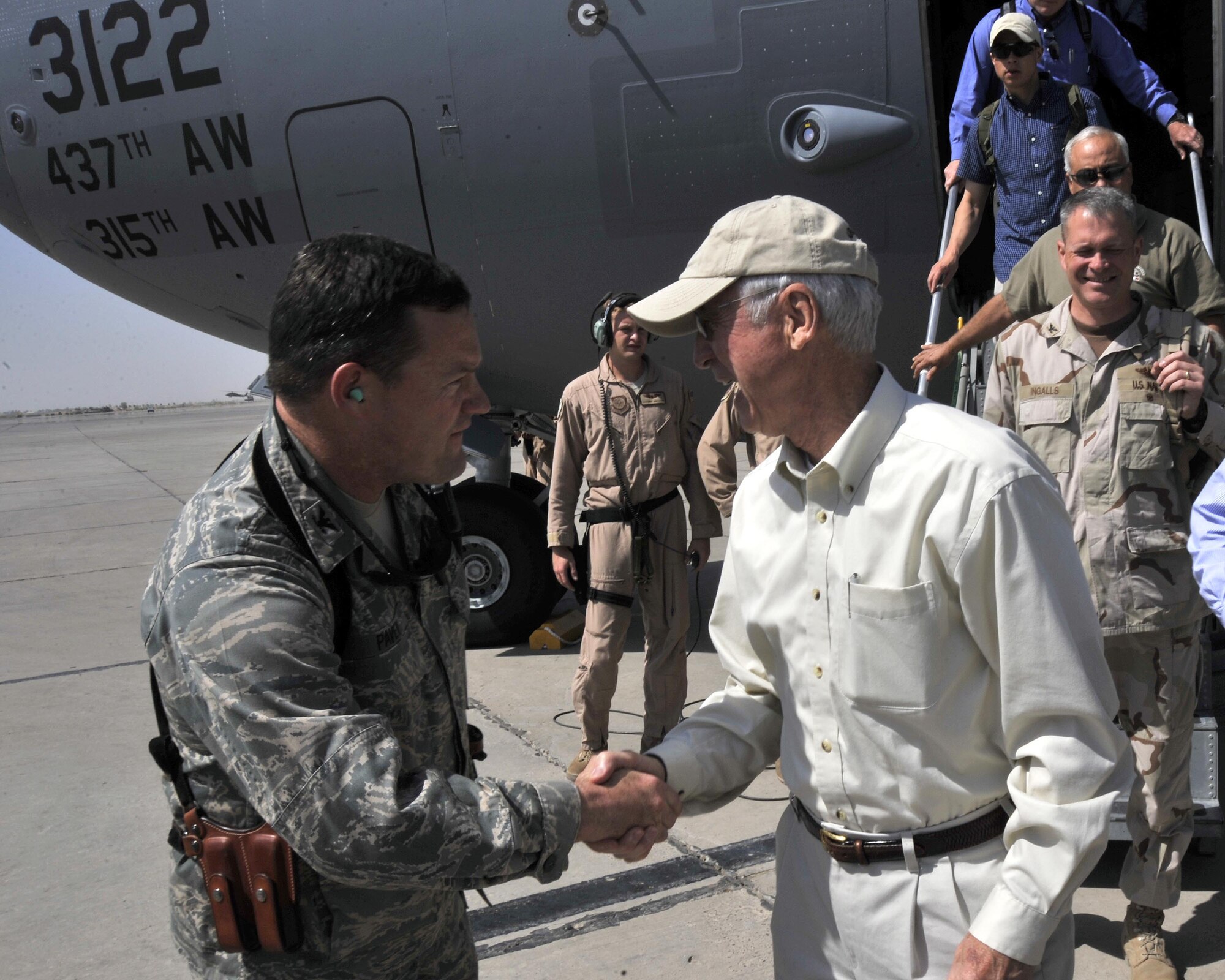 8/8/2008 - SATHER AIR BASE, Iraq ? Col. David Pavey, 447th Air Expeditionary Group commander, meets with Deputy Secretary of Defense Gordon England at Sather Air Base, on the west side of Baghdad International Airport. Secretary Gordon stopped at Sather AB as he traveled to other undisclosed locations within Iraq and other countries in the region to meet with senior American leaders and other local government officials. 
The Secretary is delegated full power and authority to act for the Secretary of Defense and exercise the powers of the Secretary on any and all matters for which the Secretary is authorized to act pursuant to law.
Colonel Pavey is responsible for supporting U.S. and coalition forces with airlift, supplies and delivery of forces and material within the Central Command area of responsibility. The Colonel is deployed to Iraq from his position as the commander, 446th Operations Group, McChord Air Force Base, Wash. (U.S. Air Force Photo by Master Sgt. Brian Davidson)
