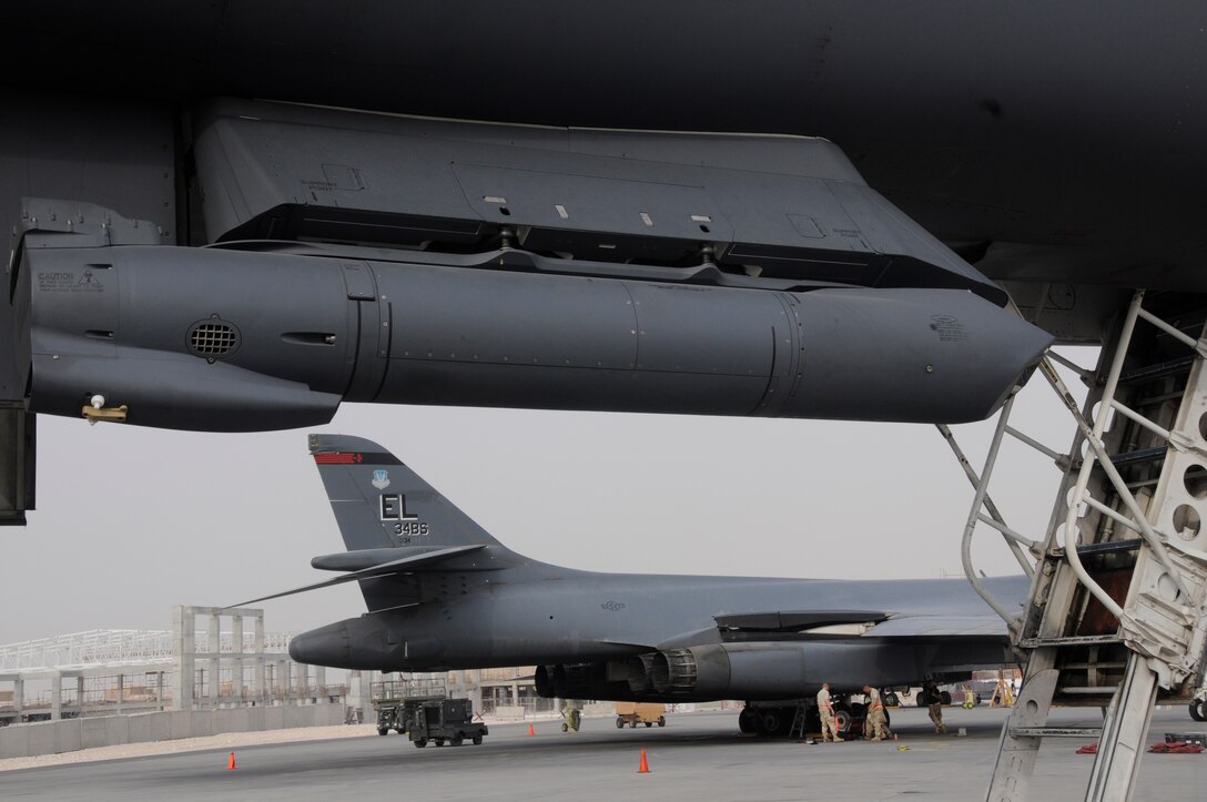 A Sniper Advanced Targeting Pod hangs from the underbelly of a B-1 Lancer after a recent mission in Southwest Asia Aug. 5. The Sniper ATP provides enhanced target identification for aircrew, allowing them to detect and analyze targets on the ground via real-time imagery. (U.S. Air Force photo by Staff Sgt. Darnell Cannady)