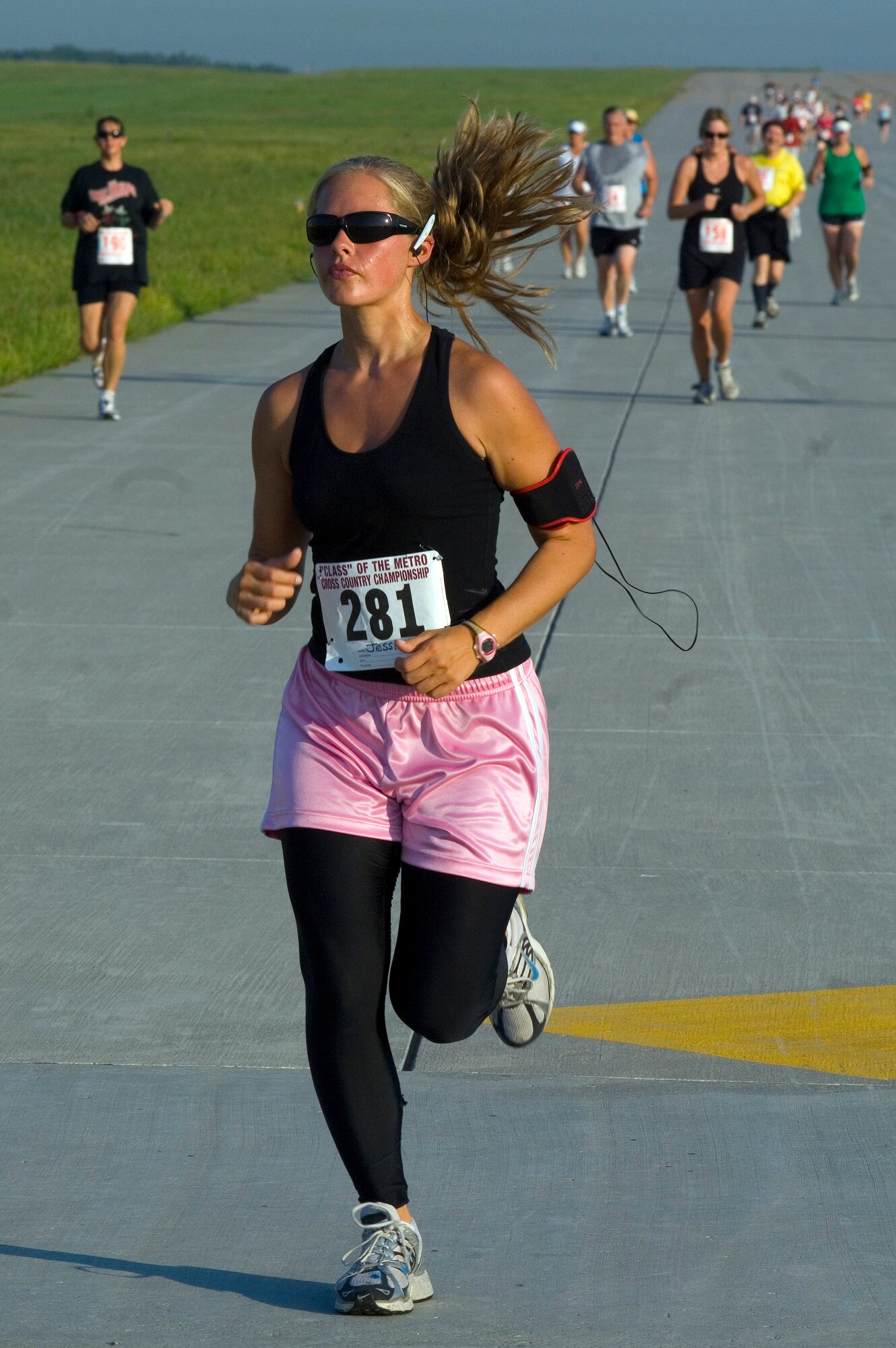 Jessica Kahnk makes her way across the three-mile marker of the seven-mile Bellevue/Offutt Runway Run Aug. 10 during Air Force Week in the Heartland supported by Offutt Air Force Base, Neb. The week is designed to broaden awareness of the Air Force's role in the war on terrorism and strengthen support for Airmen serving worldwide in defense of freedom. Ms. Kahnk is a teacher at McMillan Middle School in Omaha, Neb., and is scheduled to attend the Air Force Officer Training School in June. (U.S. Air Force photo/Staff Sgt. Bennie J. Davis III)