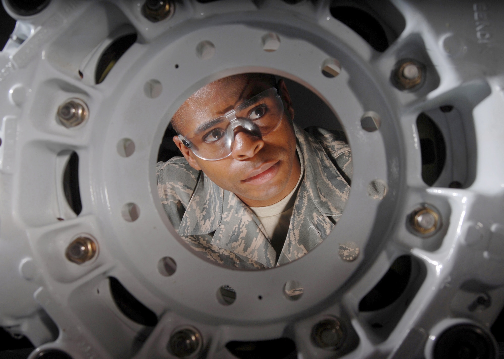 Tech. Sgt. Alan L. Scott, a pneudraulics technician from the 452nd Maintenance Squadron, inspects a KC-135 Stratotanker refueling aircraft brake assembly, July 30. Tech. Sgt. Scott works in the squadron’s hydraulic back shop. Before coming to March Air Reserve Base, Tech. Sgt. Scott was a U.S. Marine for nine years, got out and became a police officer for the city of Indio, Calif. for just under three years, then joined the Air Force Reserve. Tech. Sgt. Scott, an Air Reserve Technician (ART), has been stationed at March for two years. (U.S. Air Force photo by Val Gempis)