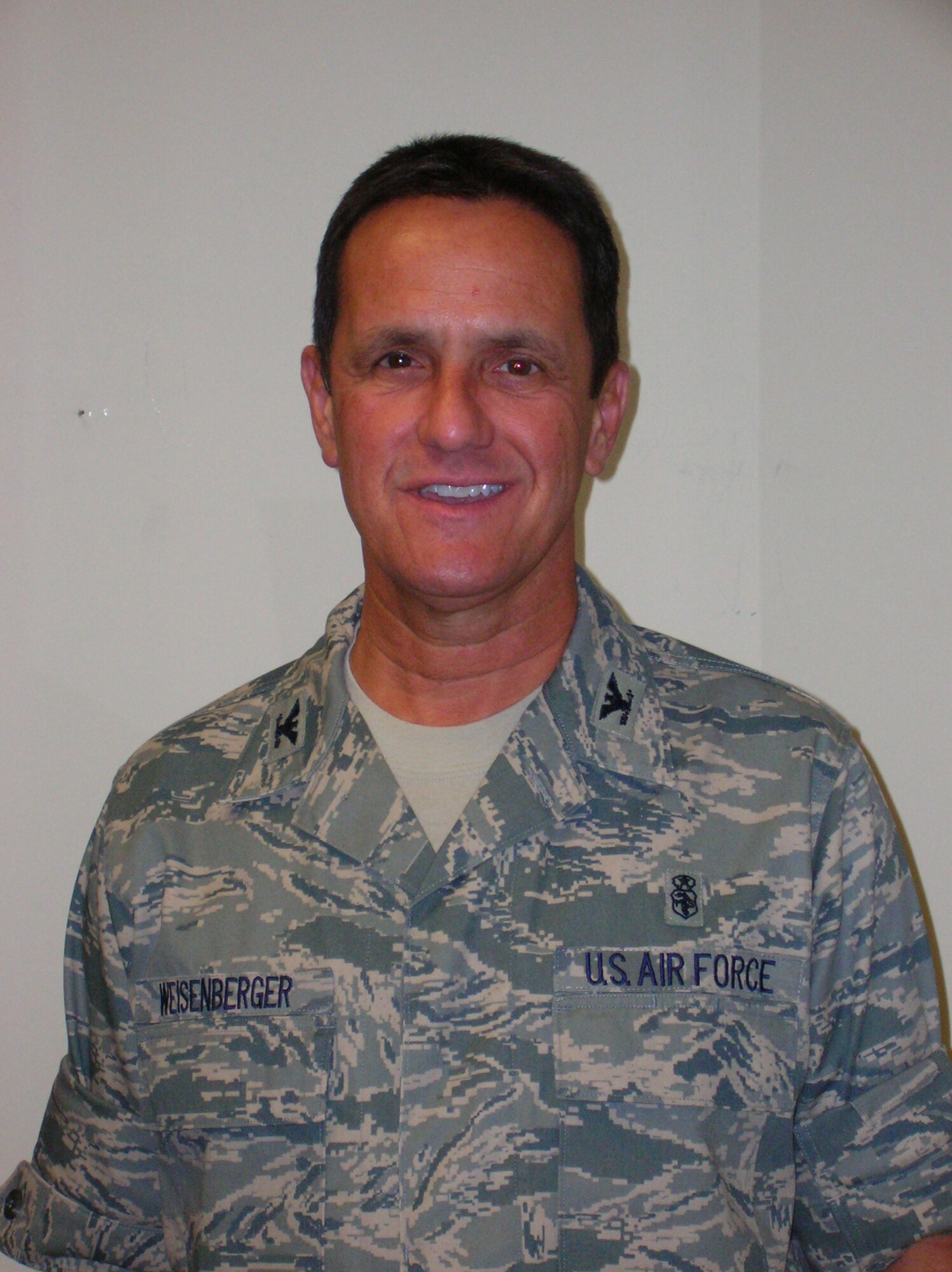 Colonel Robert J. Weisenberger assumes command of the 452nd Medical Group after
commanding the 452nd Aeromedical Staging Squadron since 2004. (U.S. Air Force photo by Capt. Caroline Lorimer)