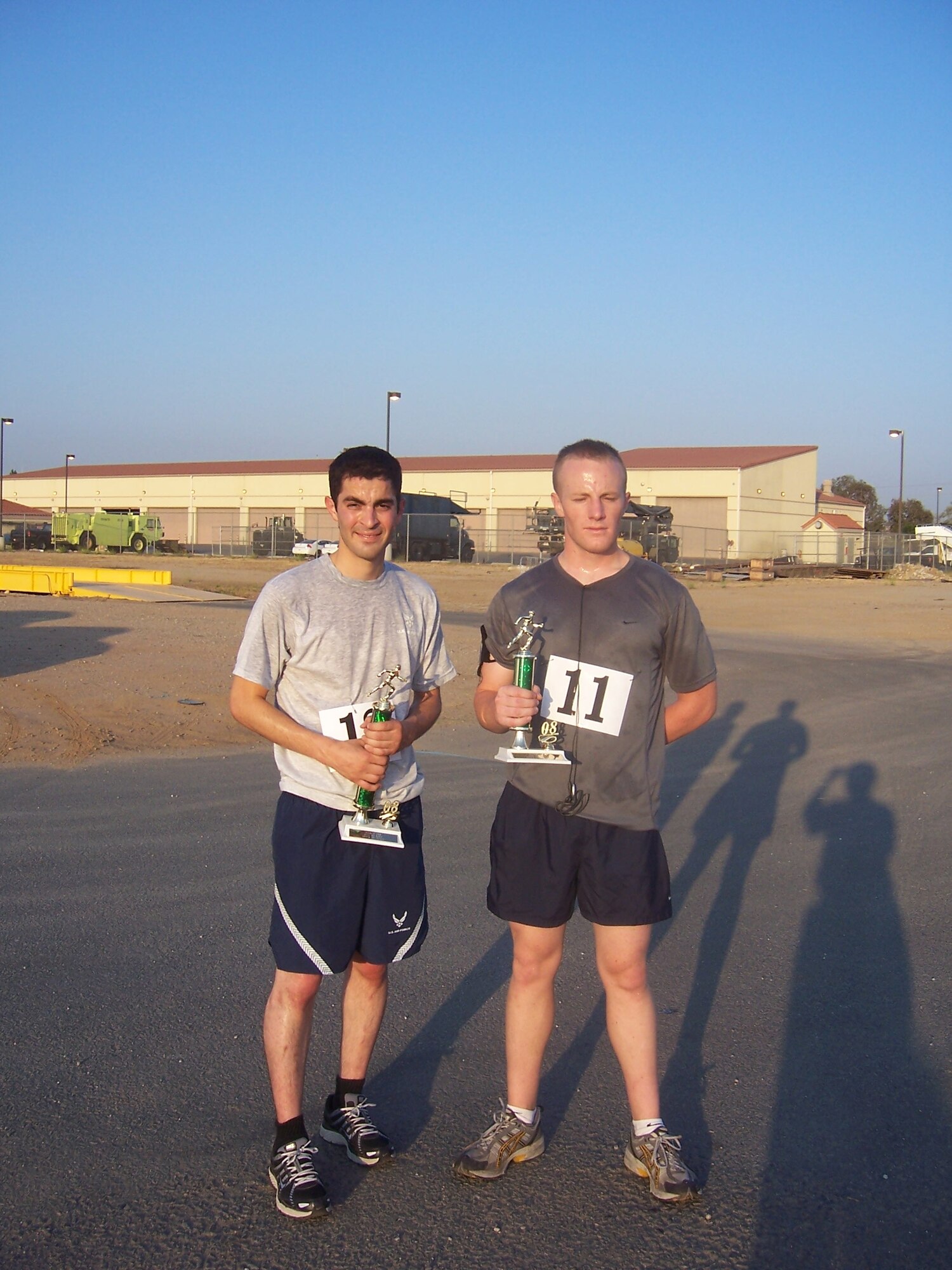 1ST & 2ND: In the men’s category, Anthony Peccerillo, 452 AES (left), took 1st place; Nick Bennett, 701 COS, took 2nd place. (U.S. Air Force photo by Pam Smith)